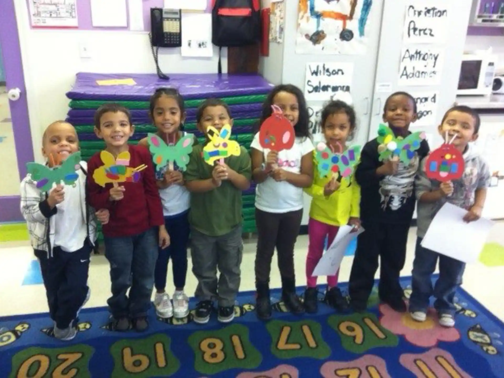 a group of children posing for a photo