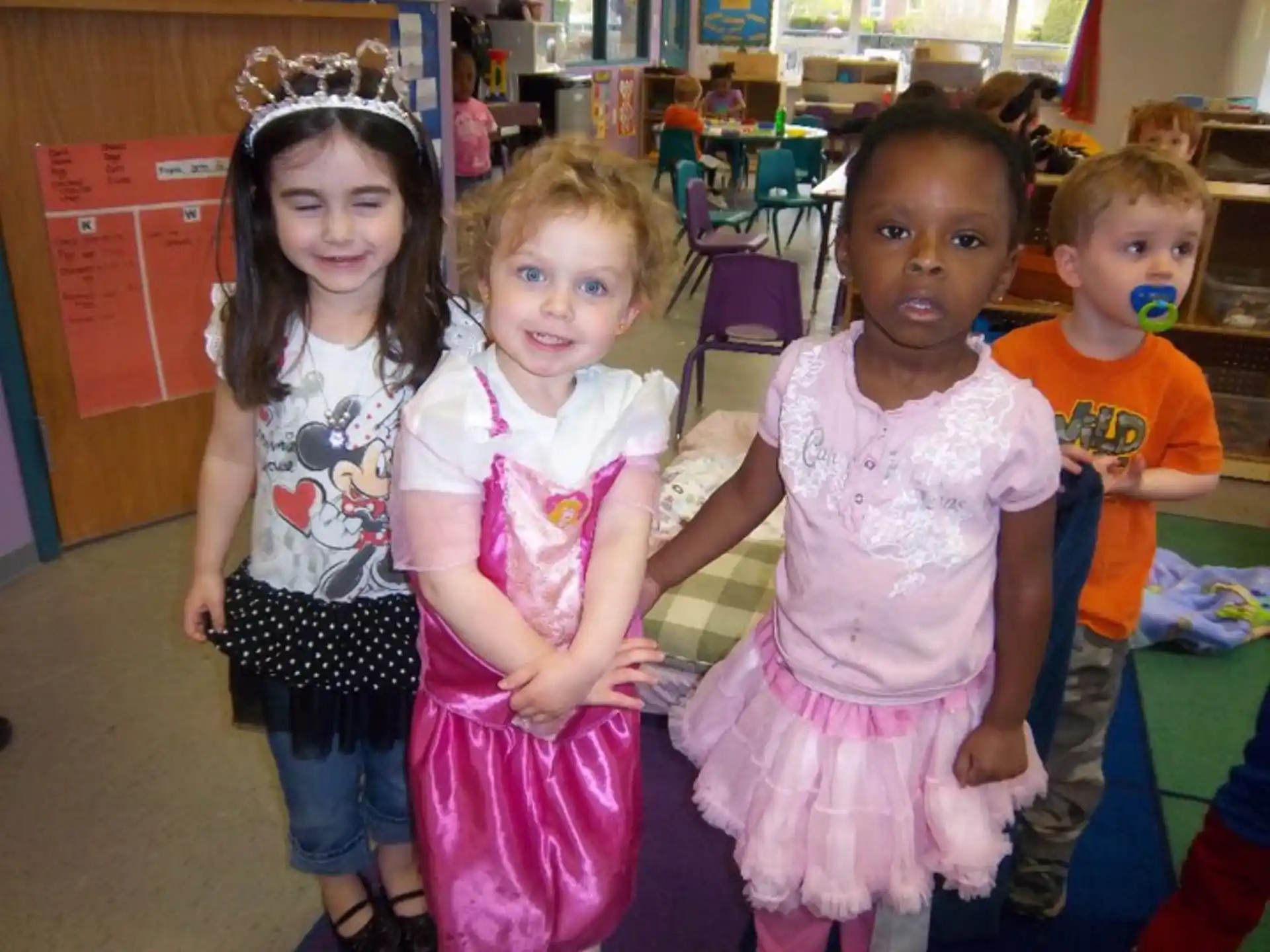 a group of children posing for a photo