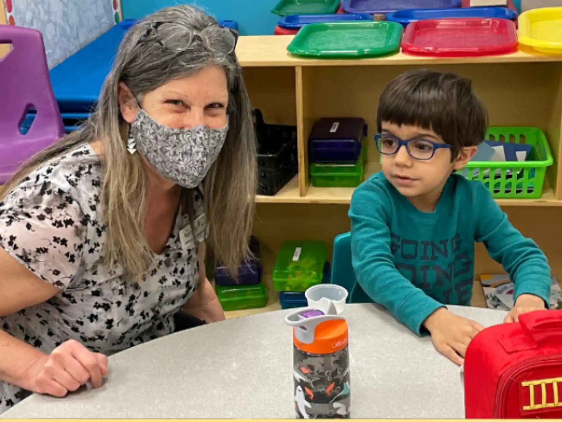 a person and a boy with a face paint