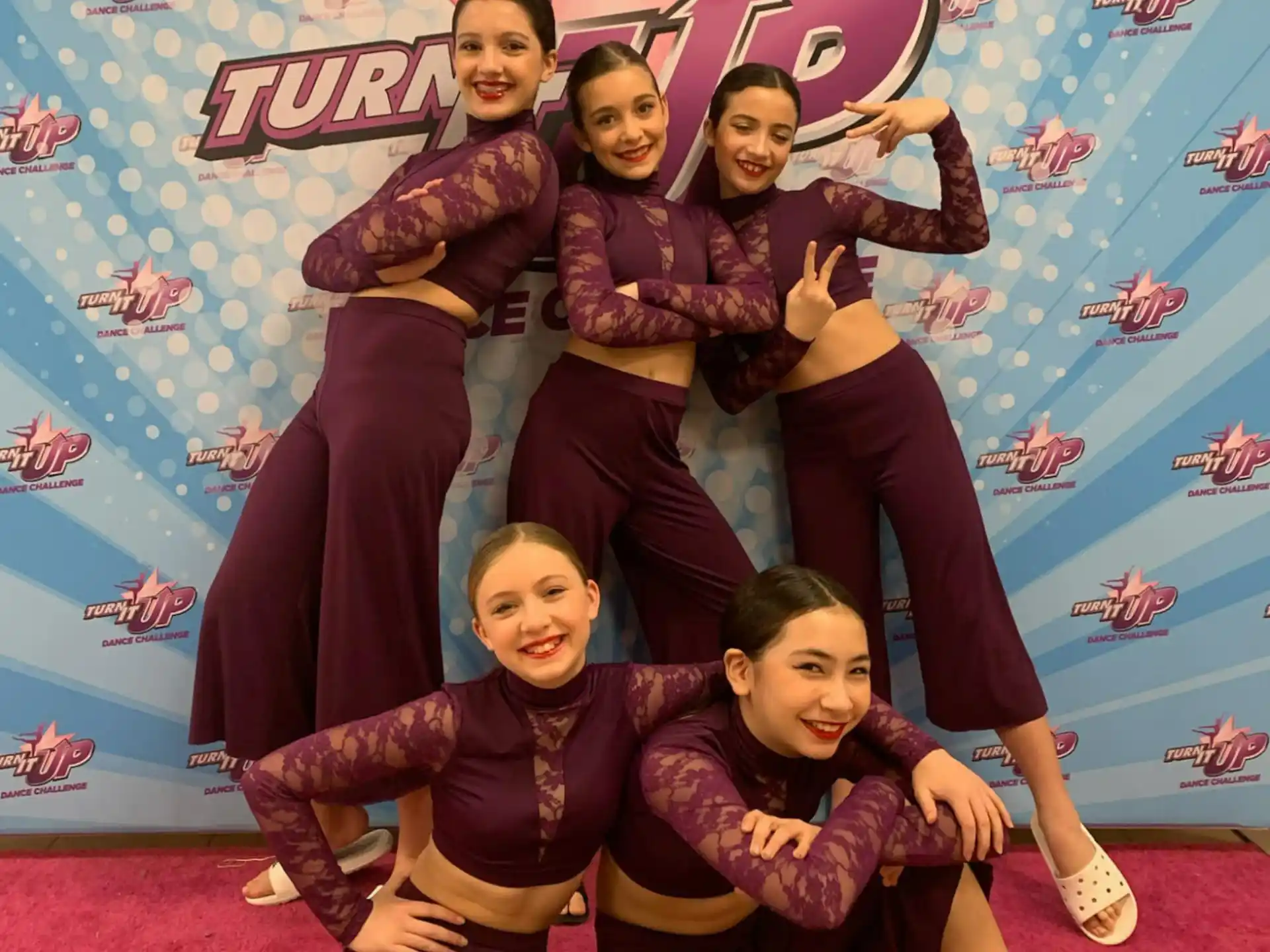 a group of children posing for a photo