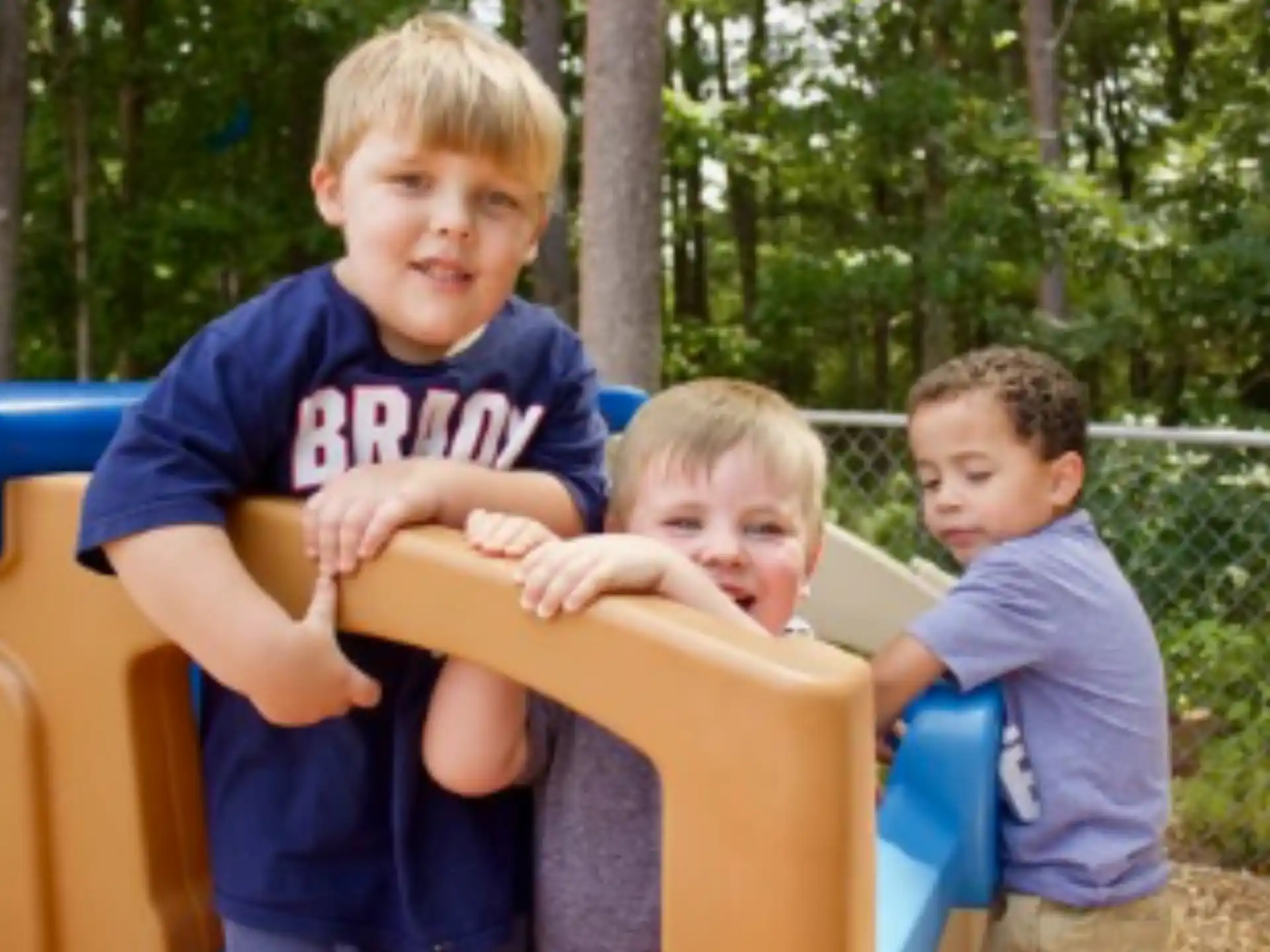 a group of boys posing for a picture
