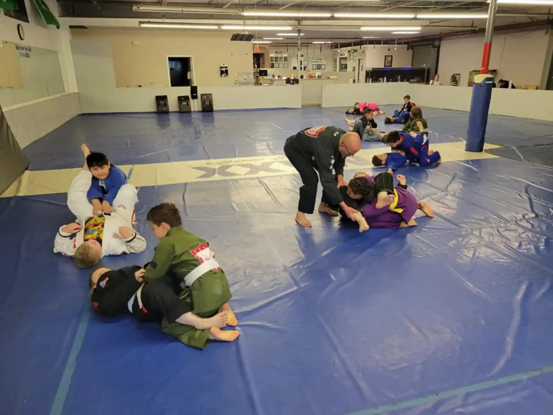 a group of people kneeling on the floor