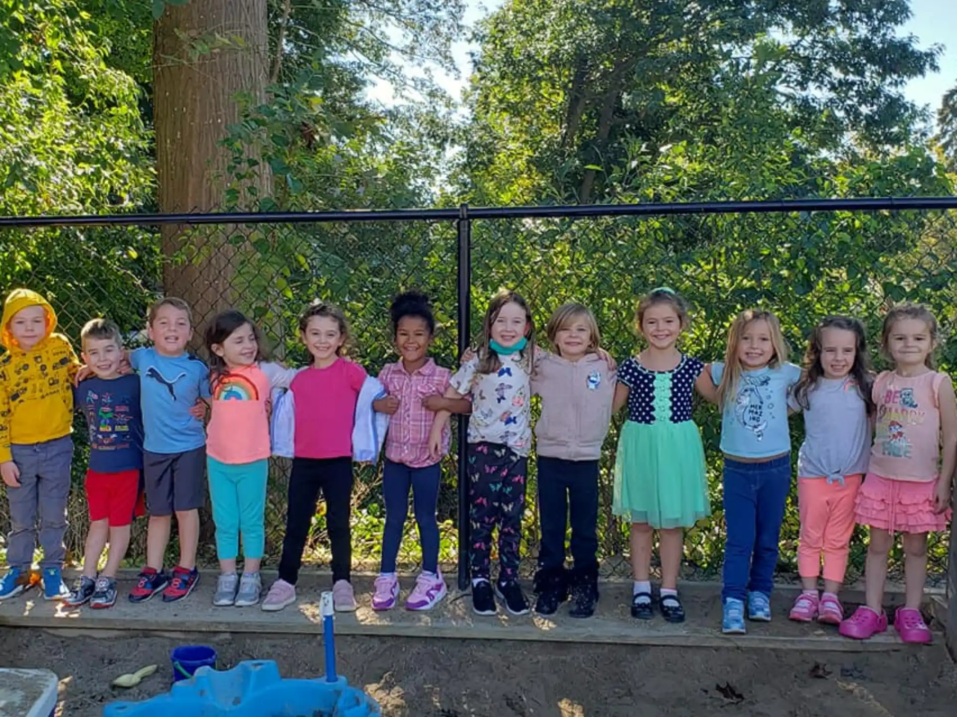 a group of children posing for a photo