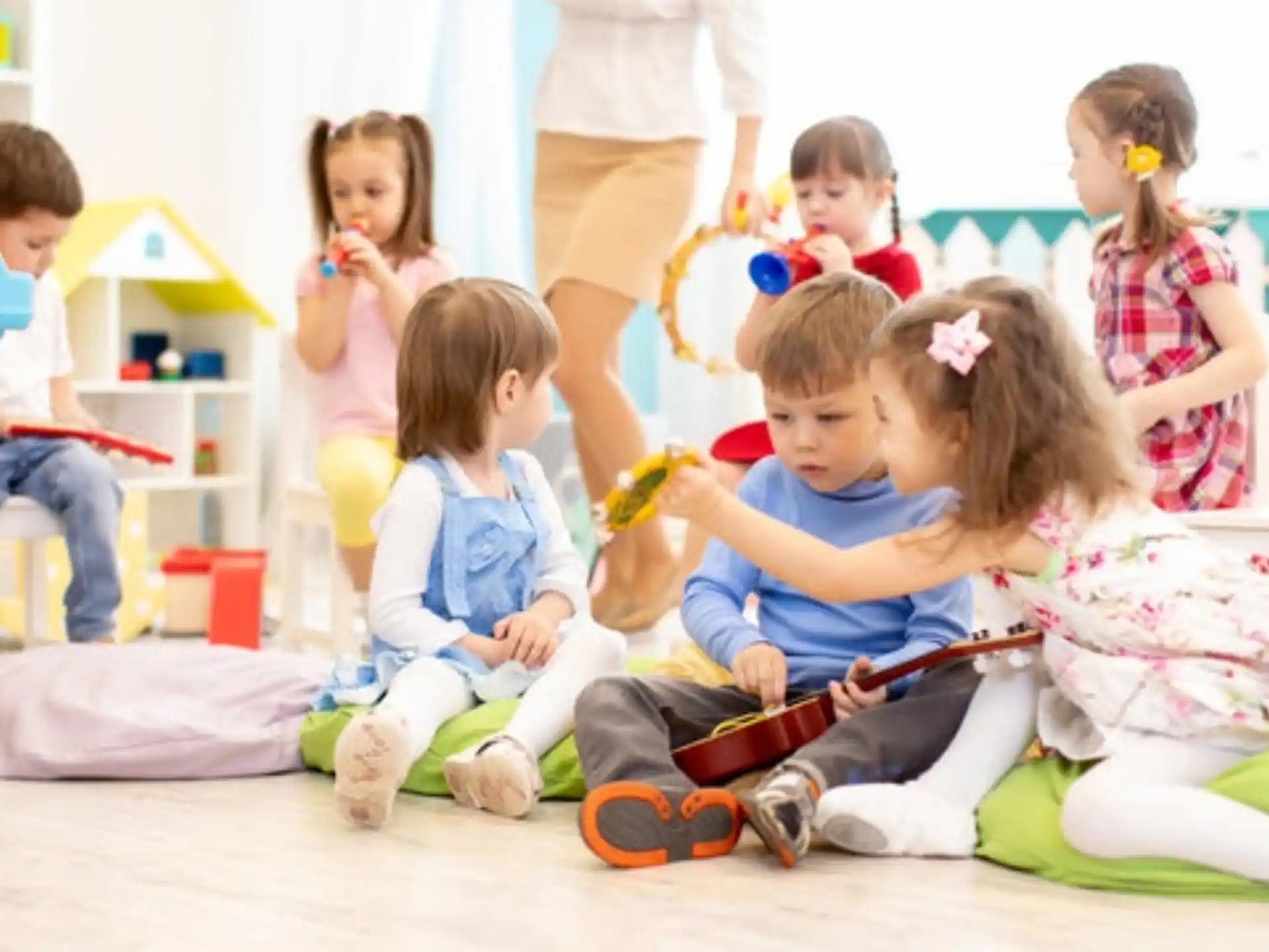 a group of children sitting on the floor