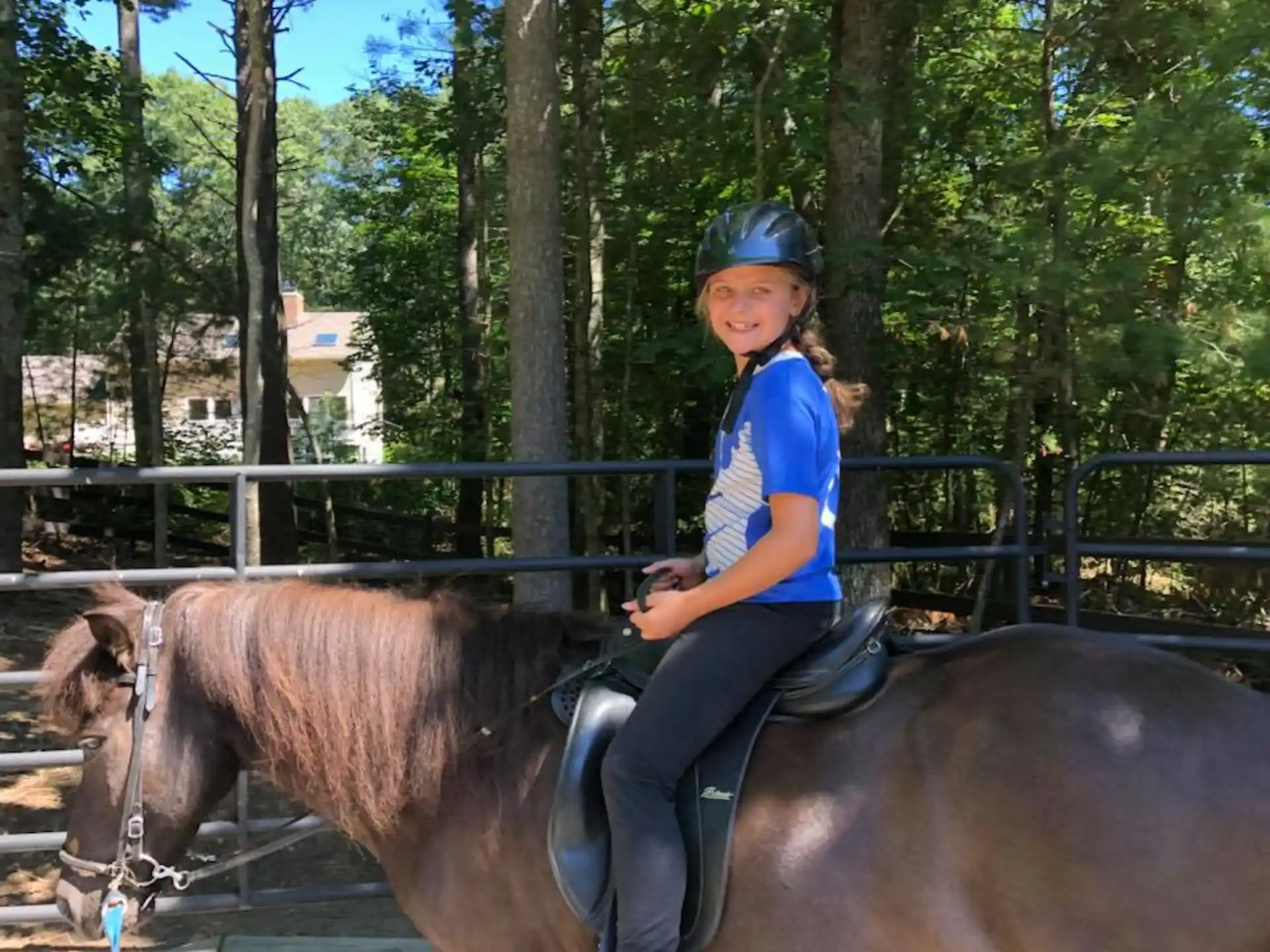 a girl riding a horse