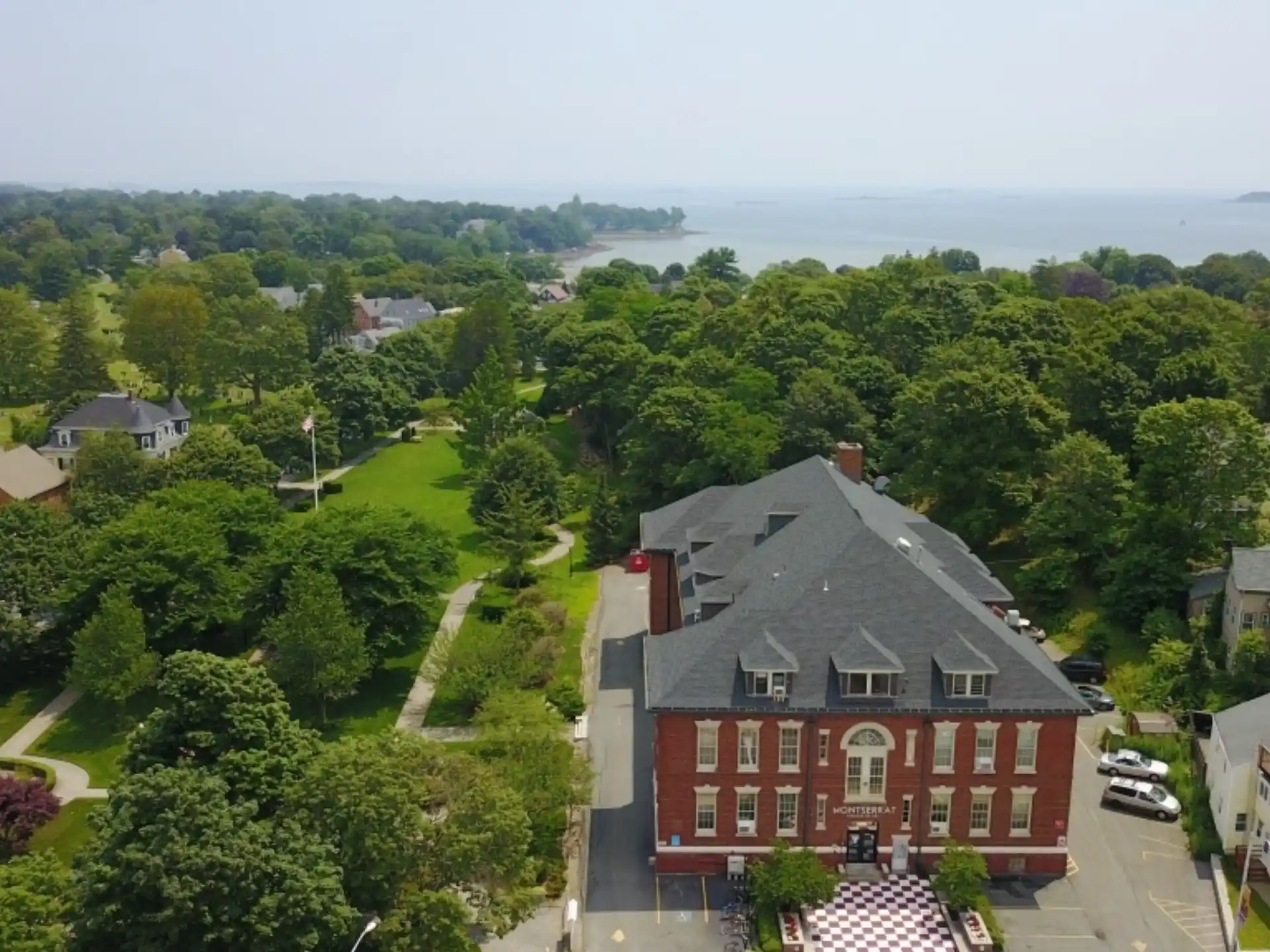 a large building surrounded by trees
