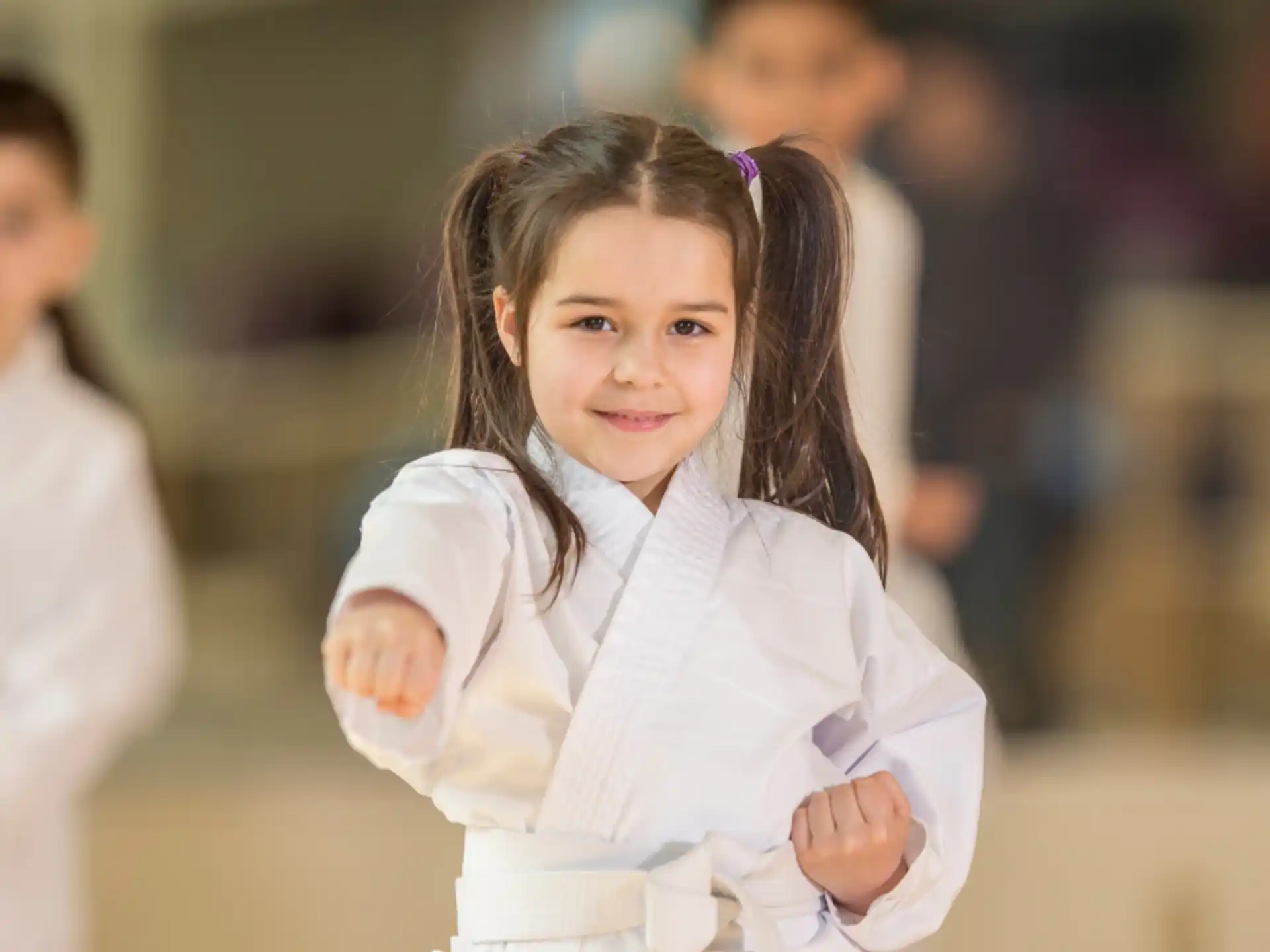 a young girl in a white shirt