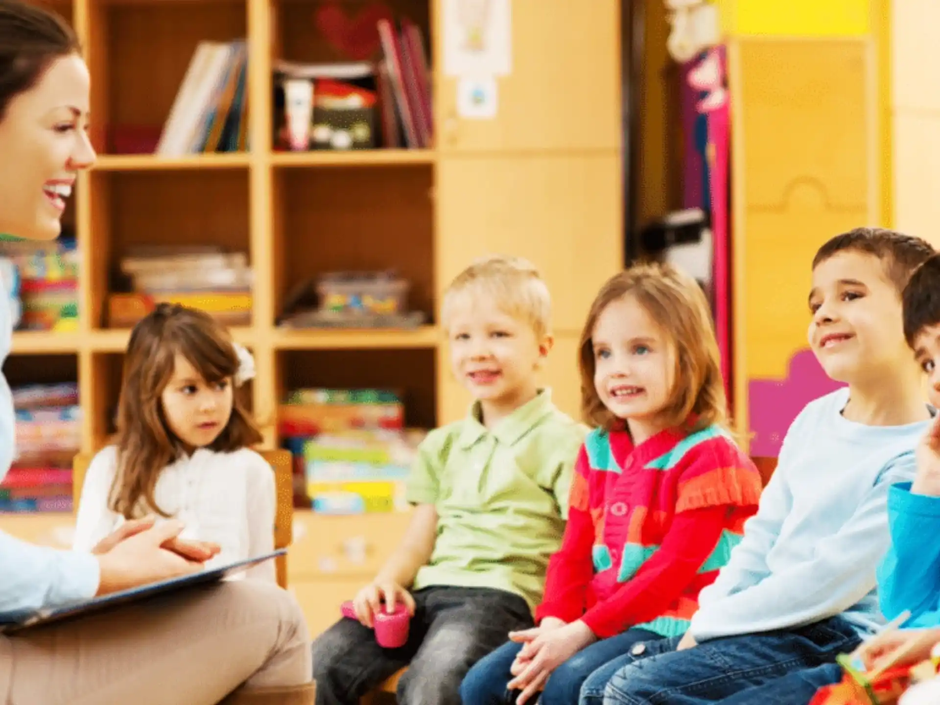 a person and a group of children