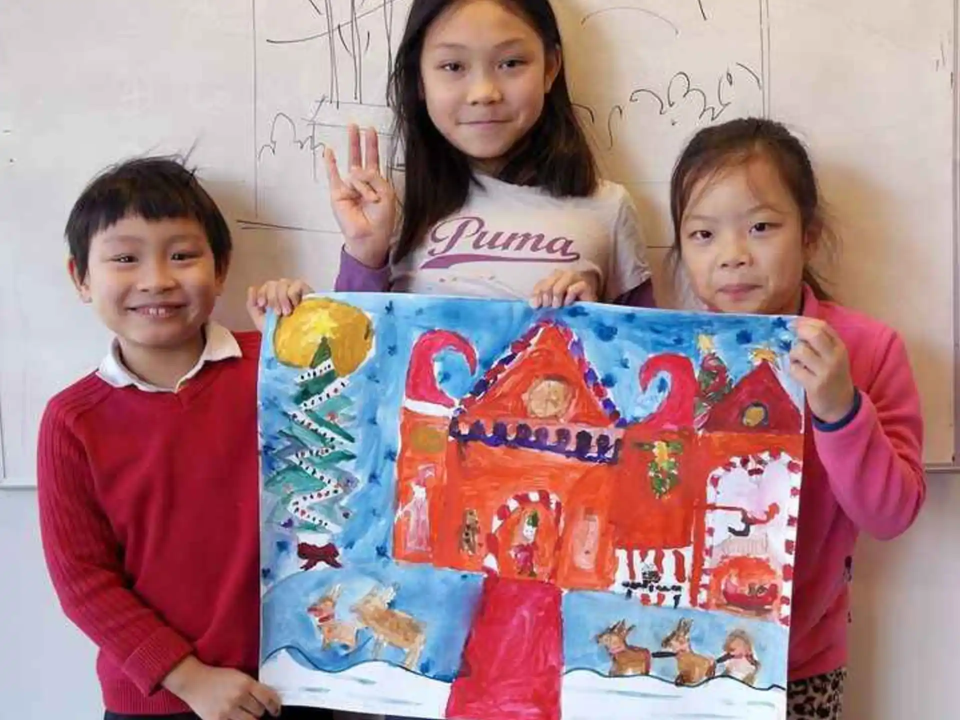 a group of children holding a poster