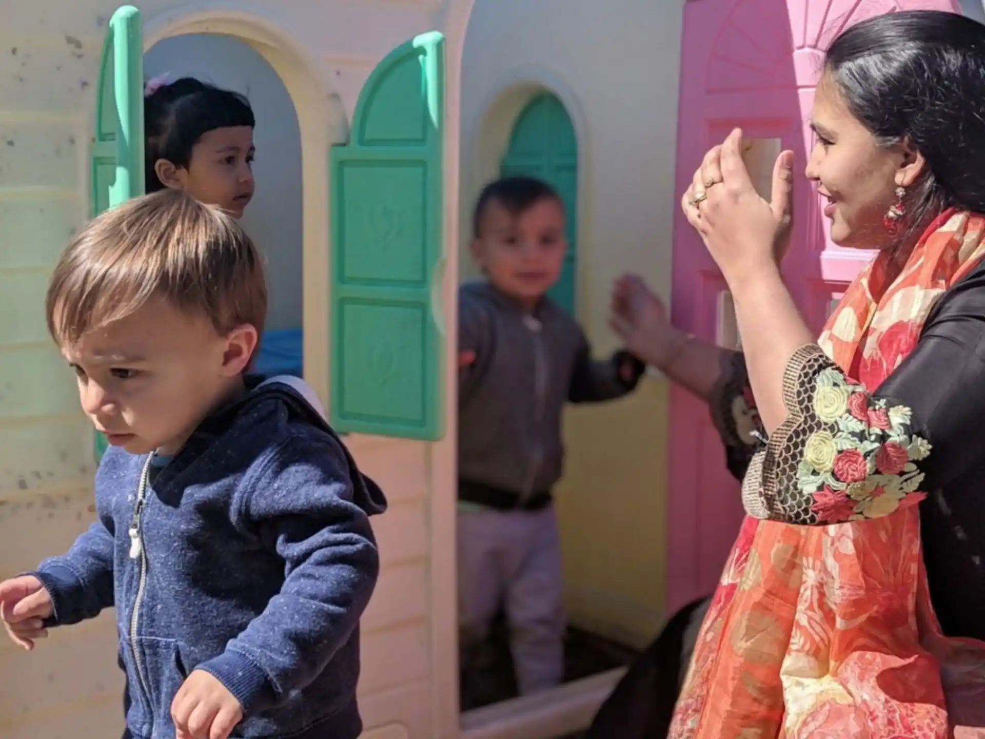 a person and a group of children
