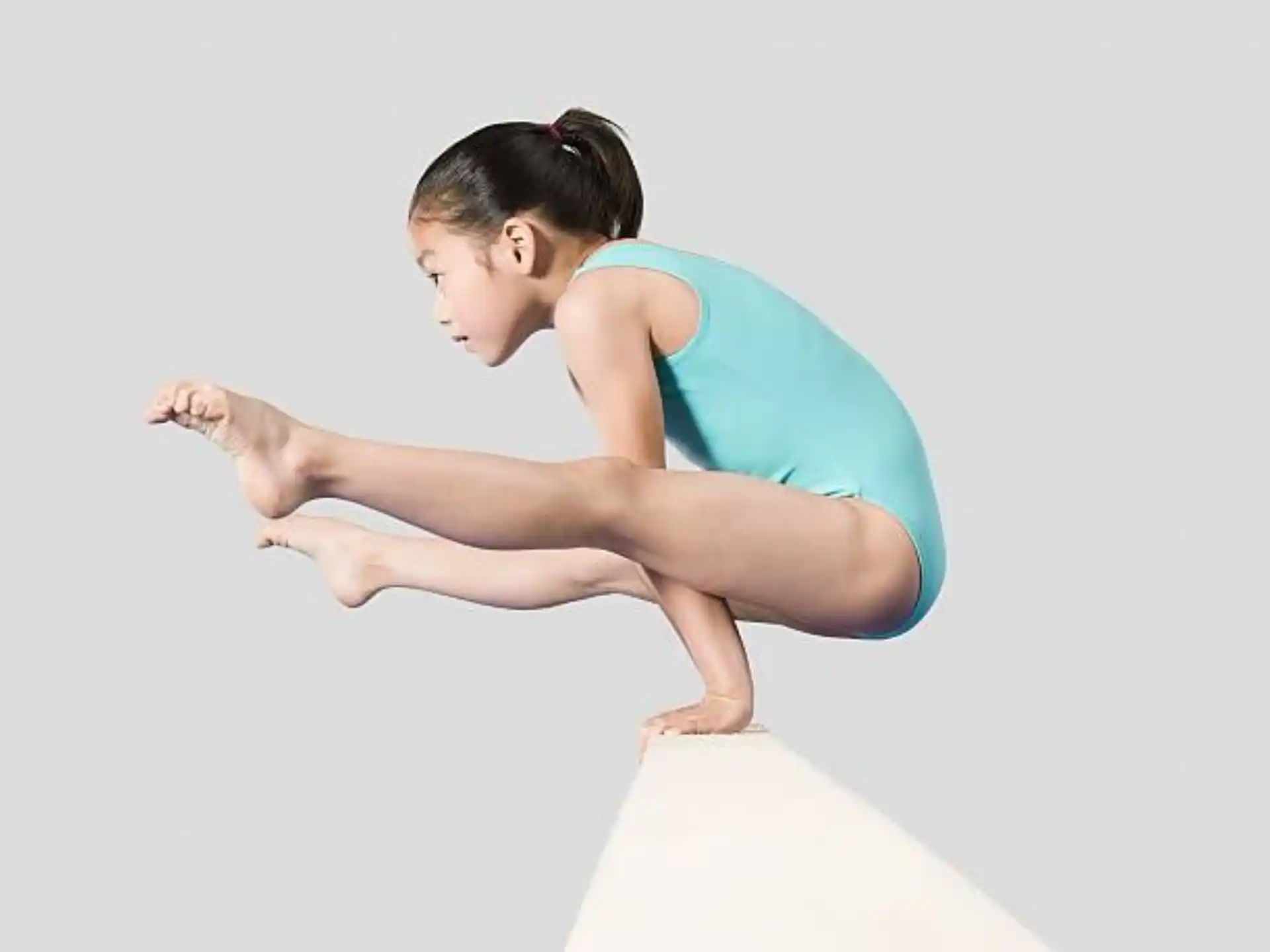 a woman doing a yoga pose