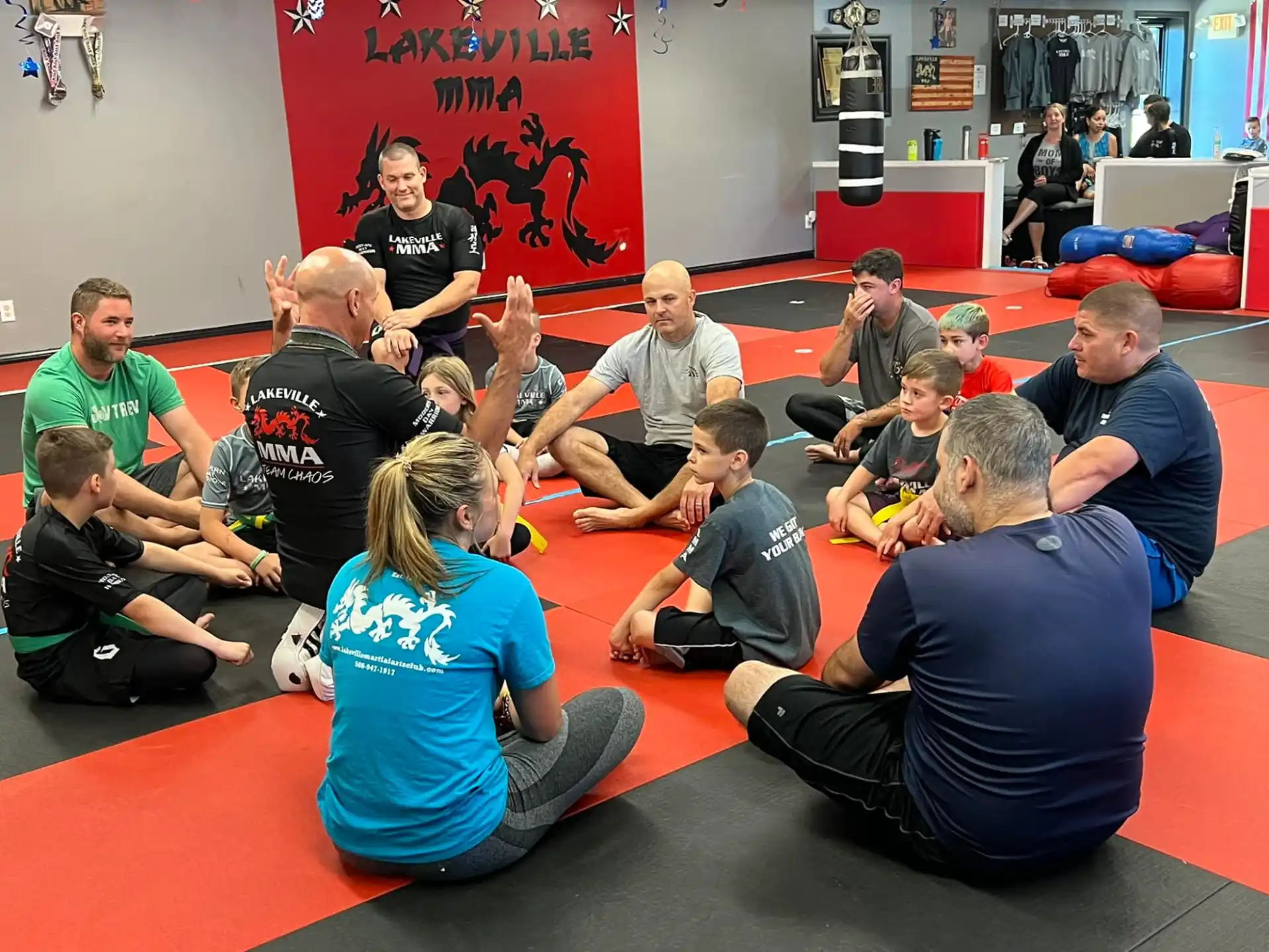 a group of people sitting on the floor