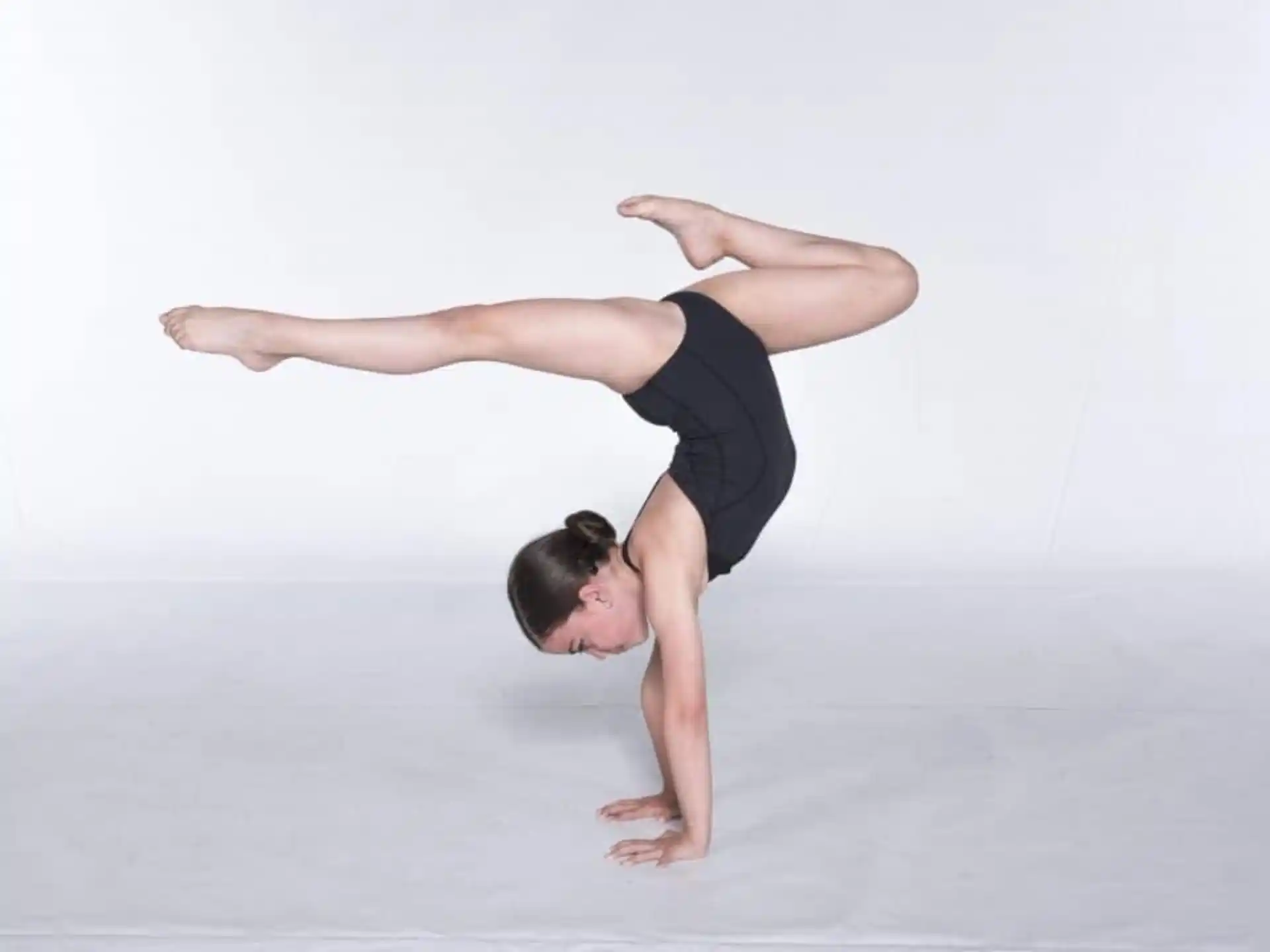 a person doing a handstand
