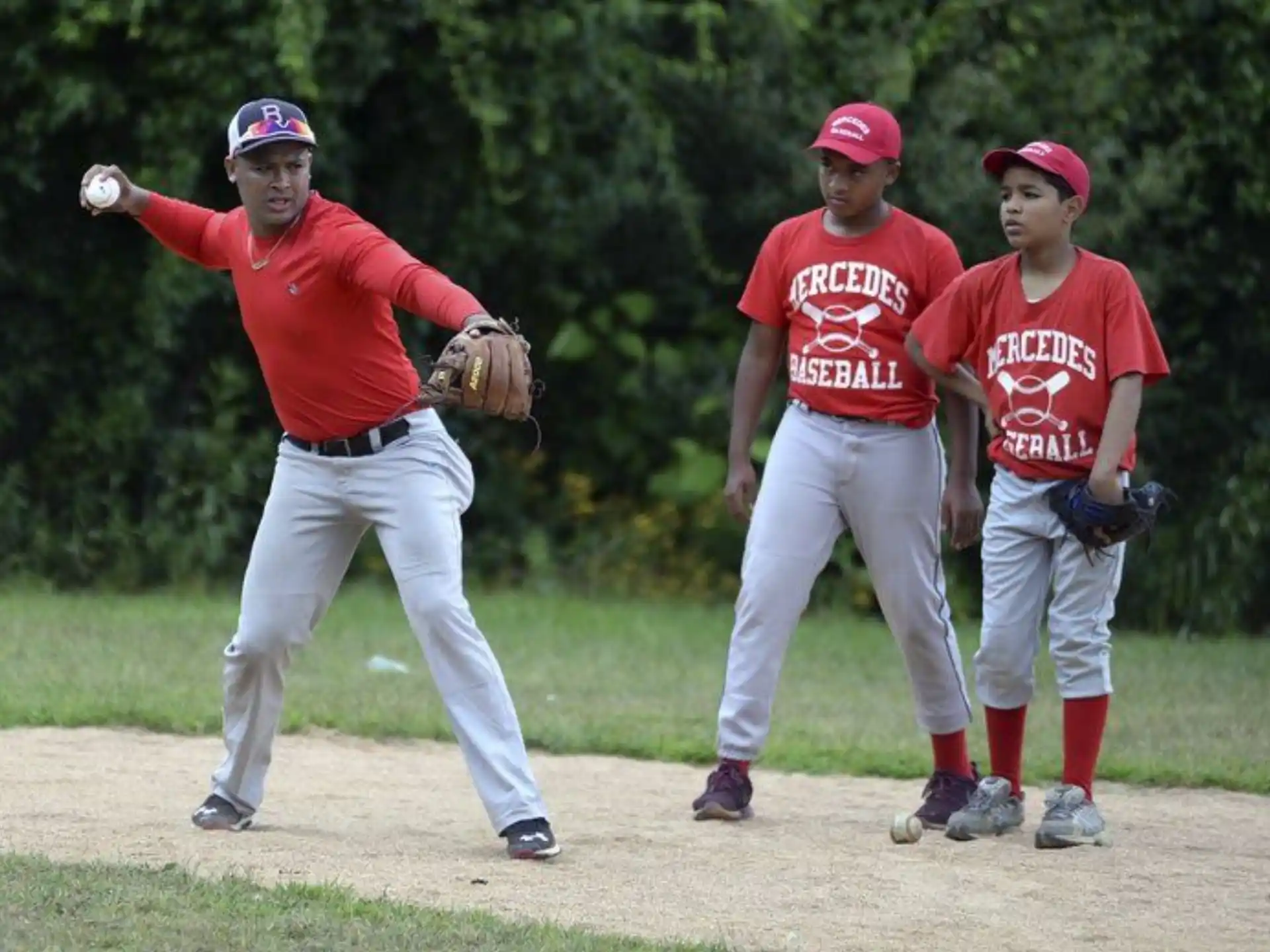 a baseball player throwing a ball