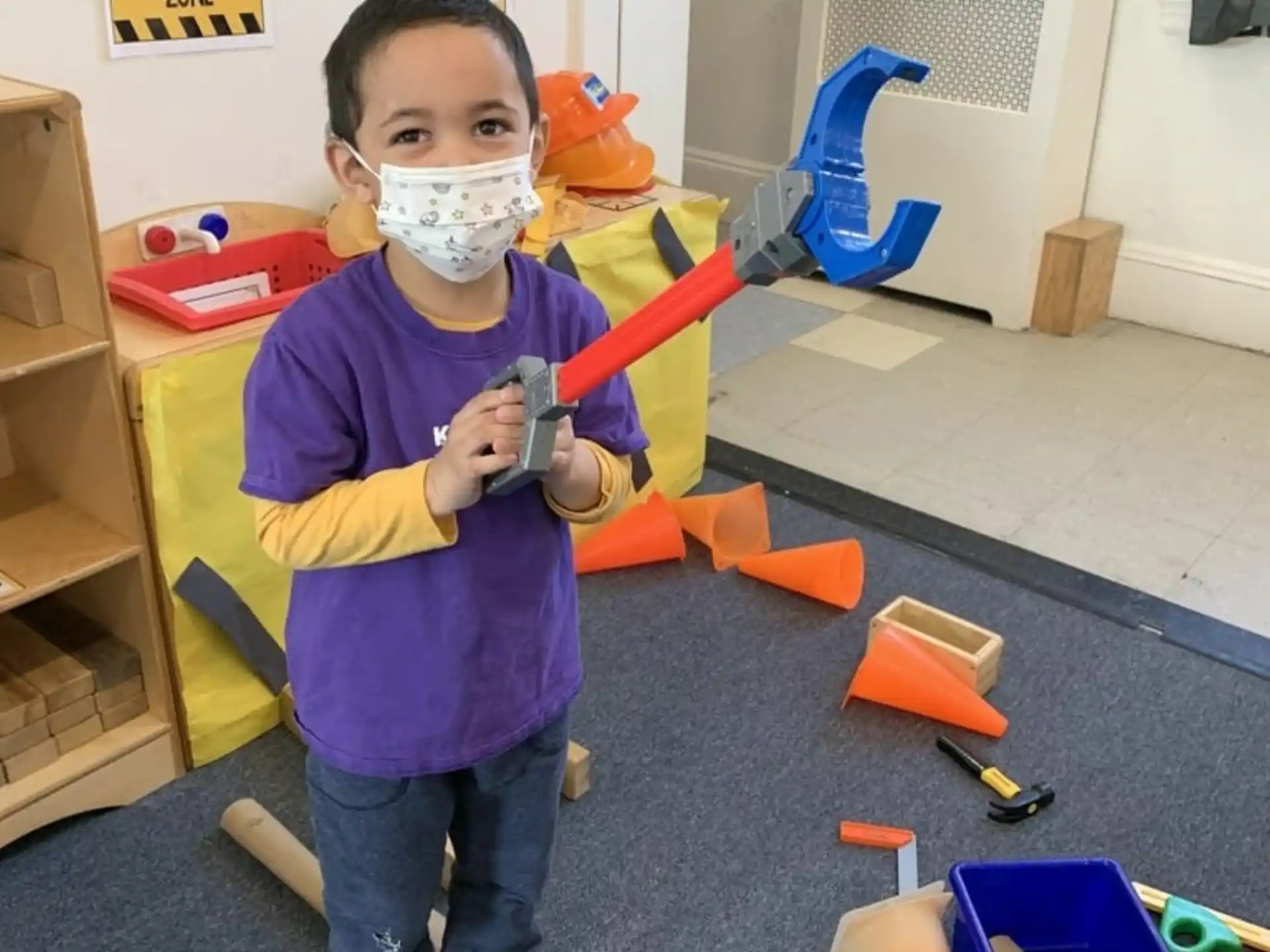 a boy with a mask on his face