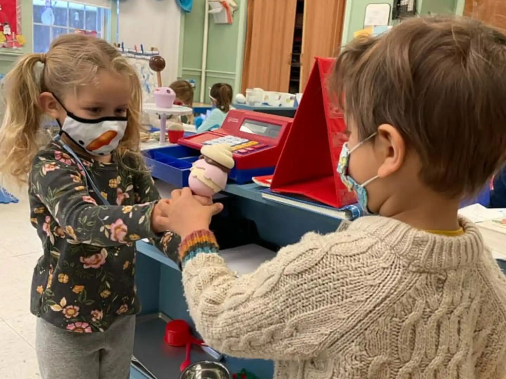 a person and a child wearing masks