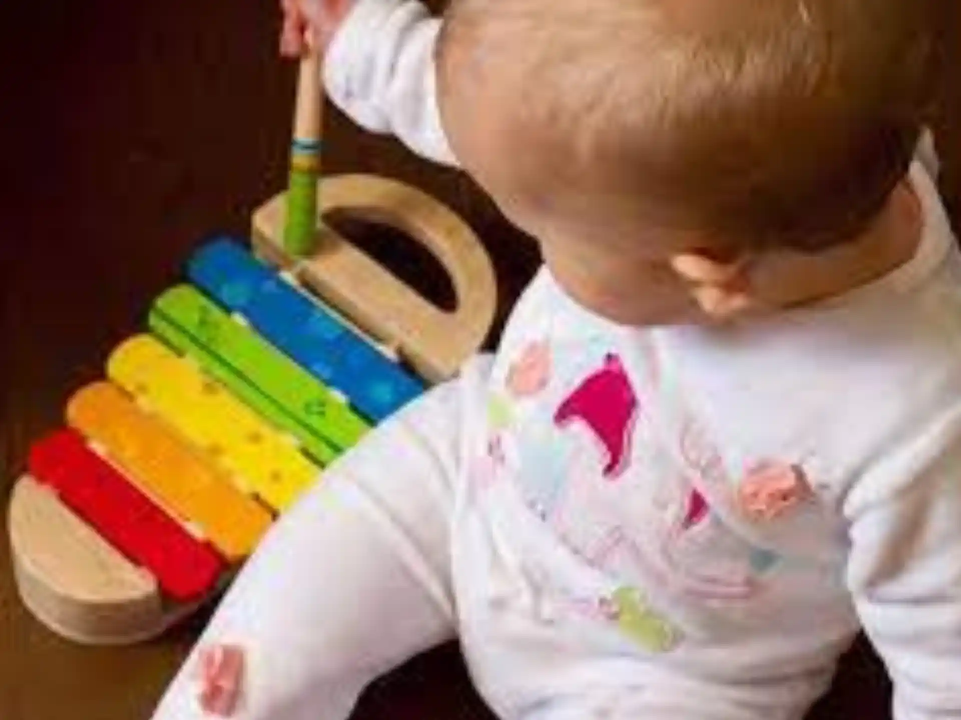 a baby with a toy