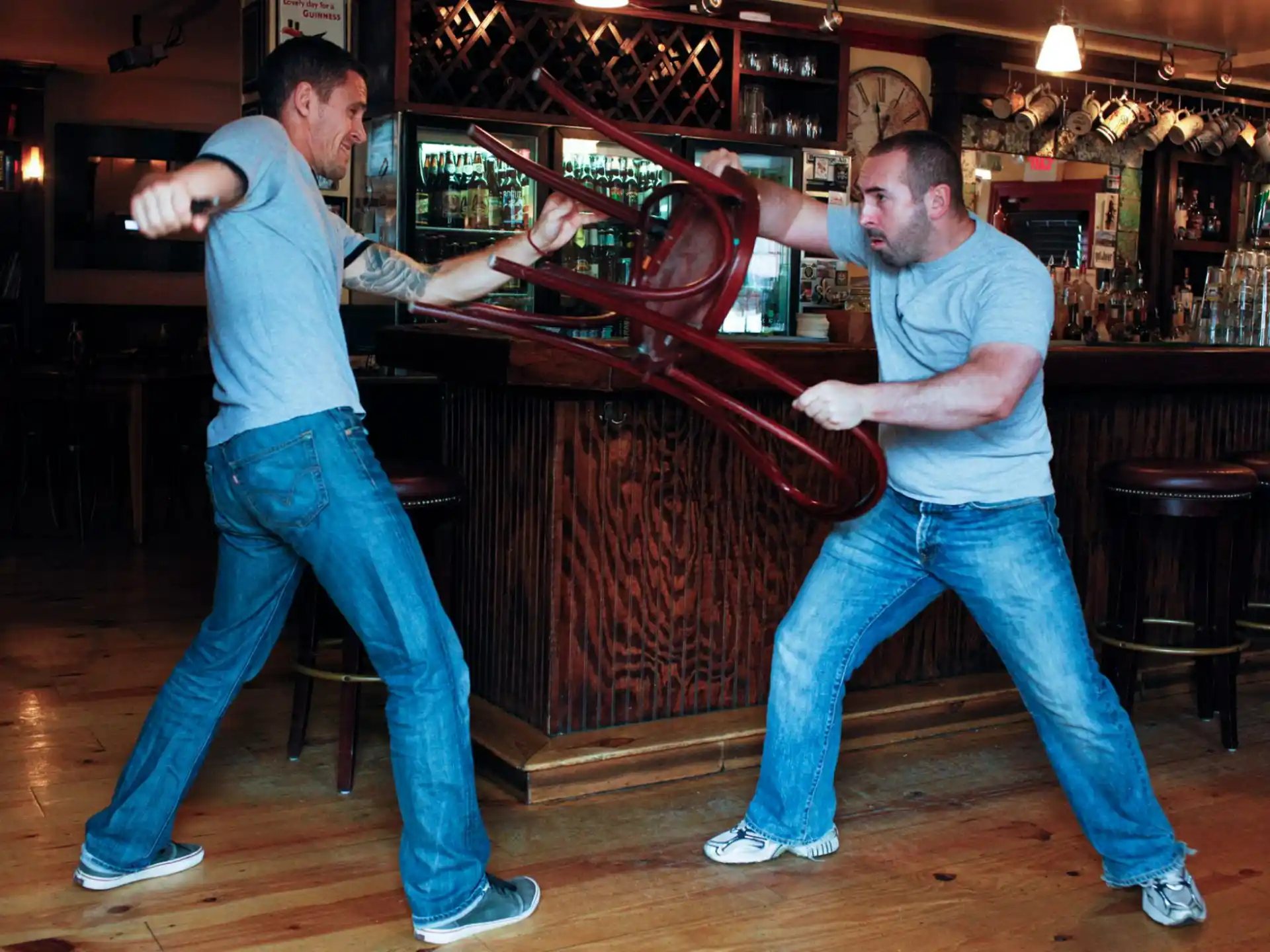 a couple of men playing a video game