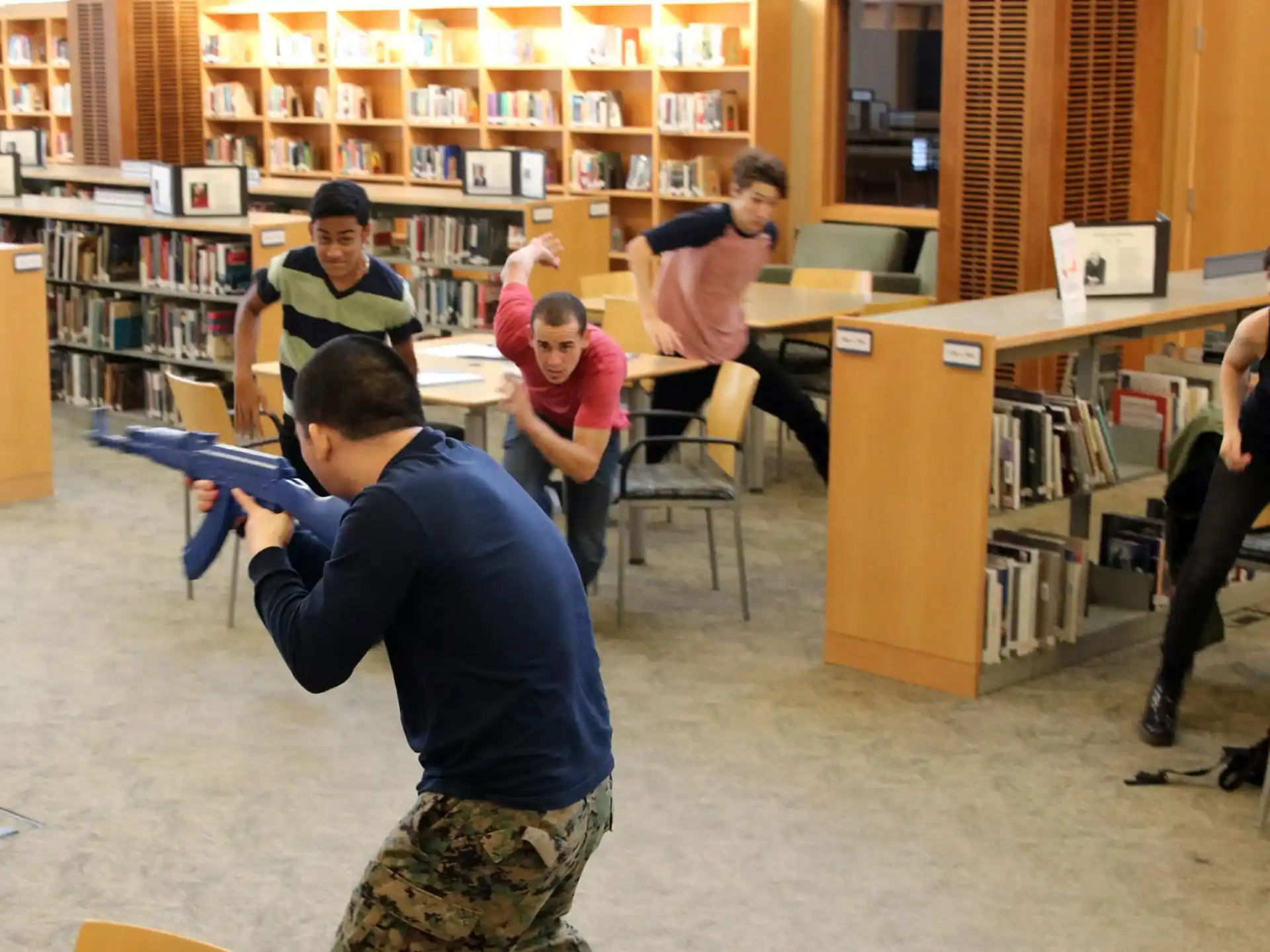 a group of people in a library