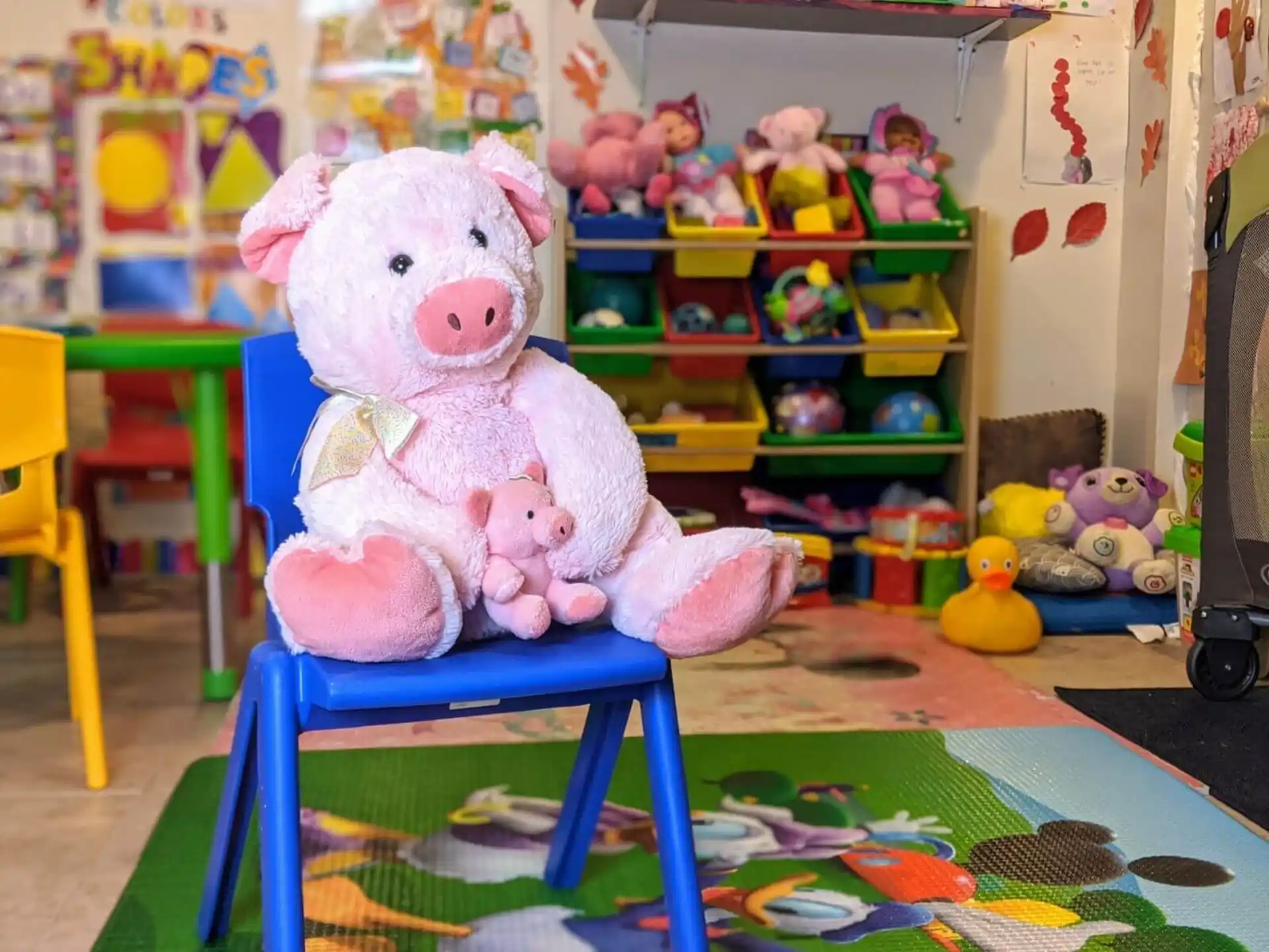 a stuffed bear on a chair