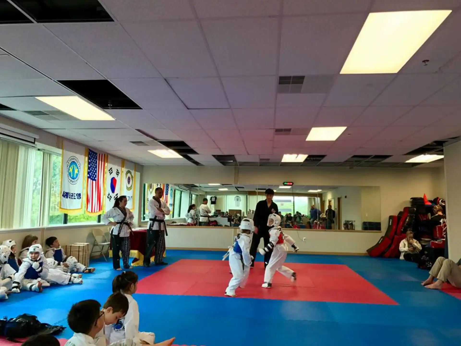 a group of people in a karate class