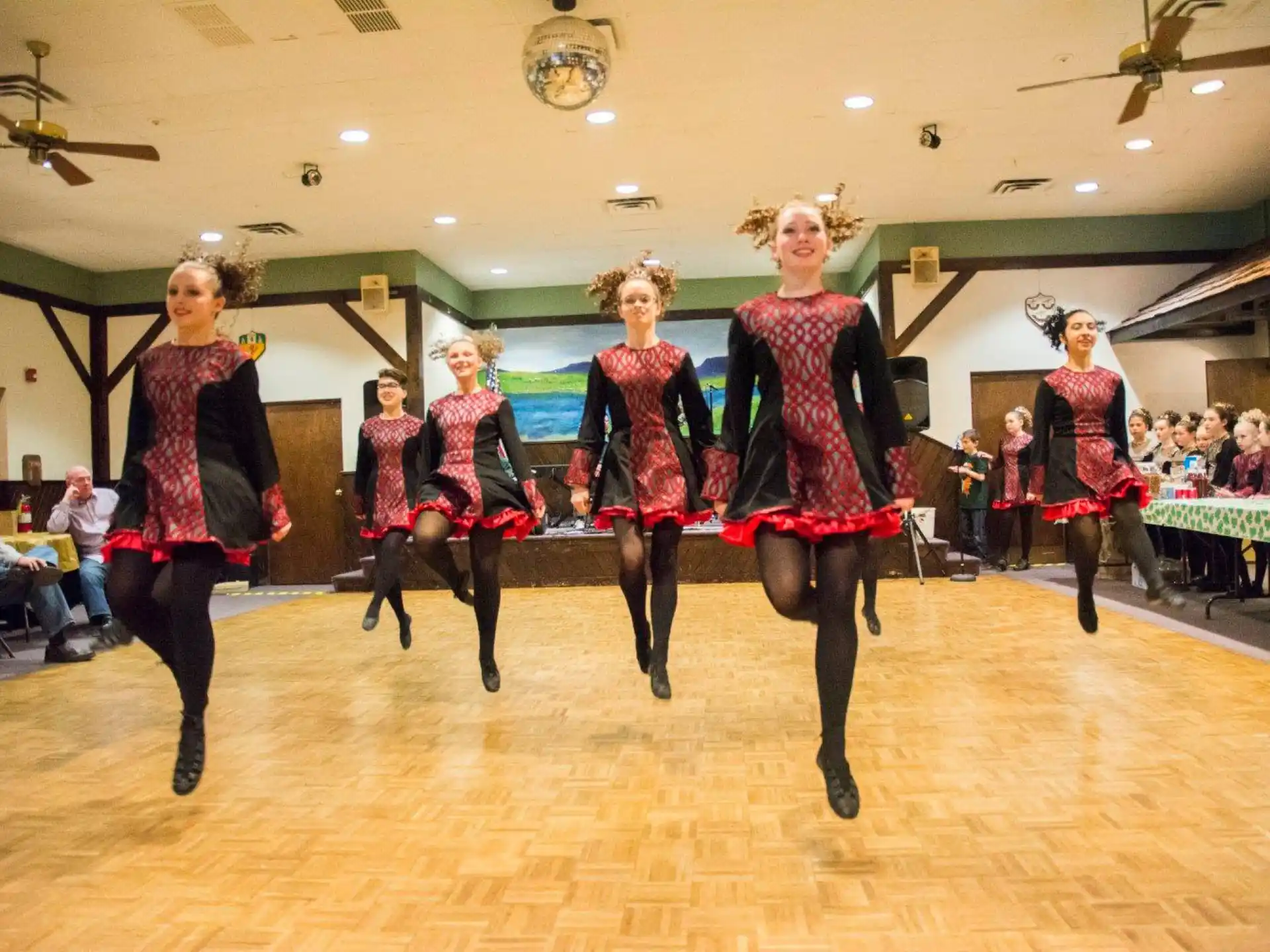 a group of women dancing on a stage