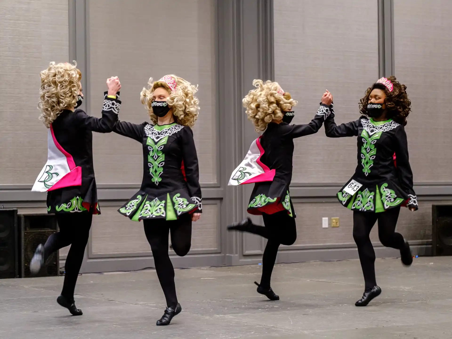 a group of women wearing clothing