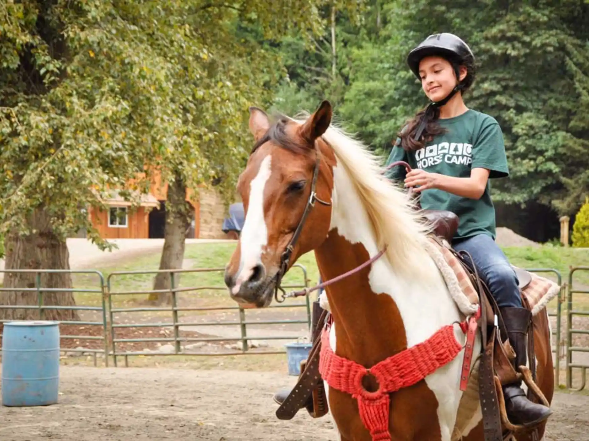 a girl riding a horse