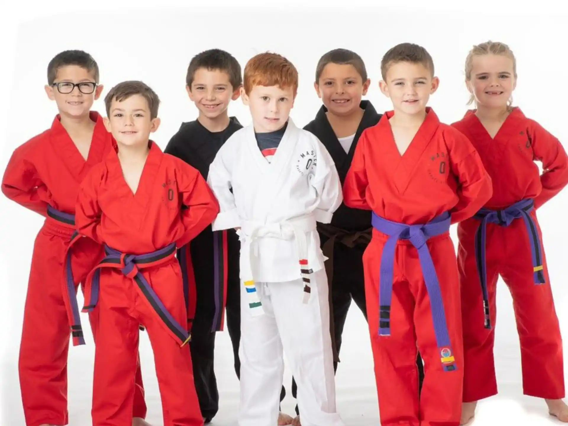 a group of people in martial arts uniforms