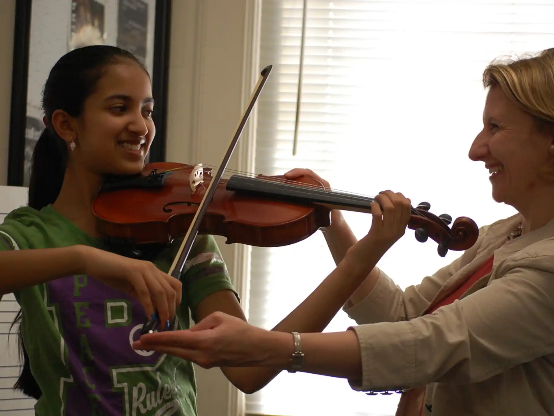 a person playing a violin