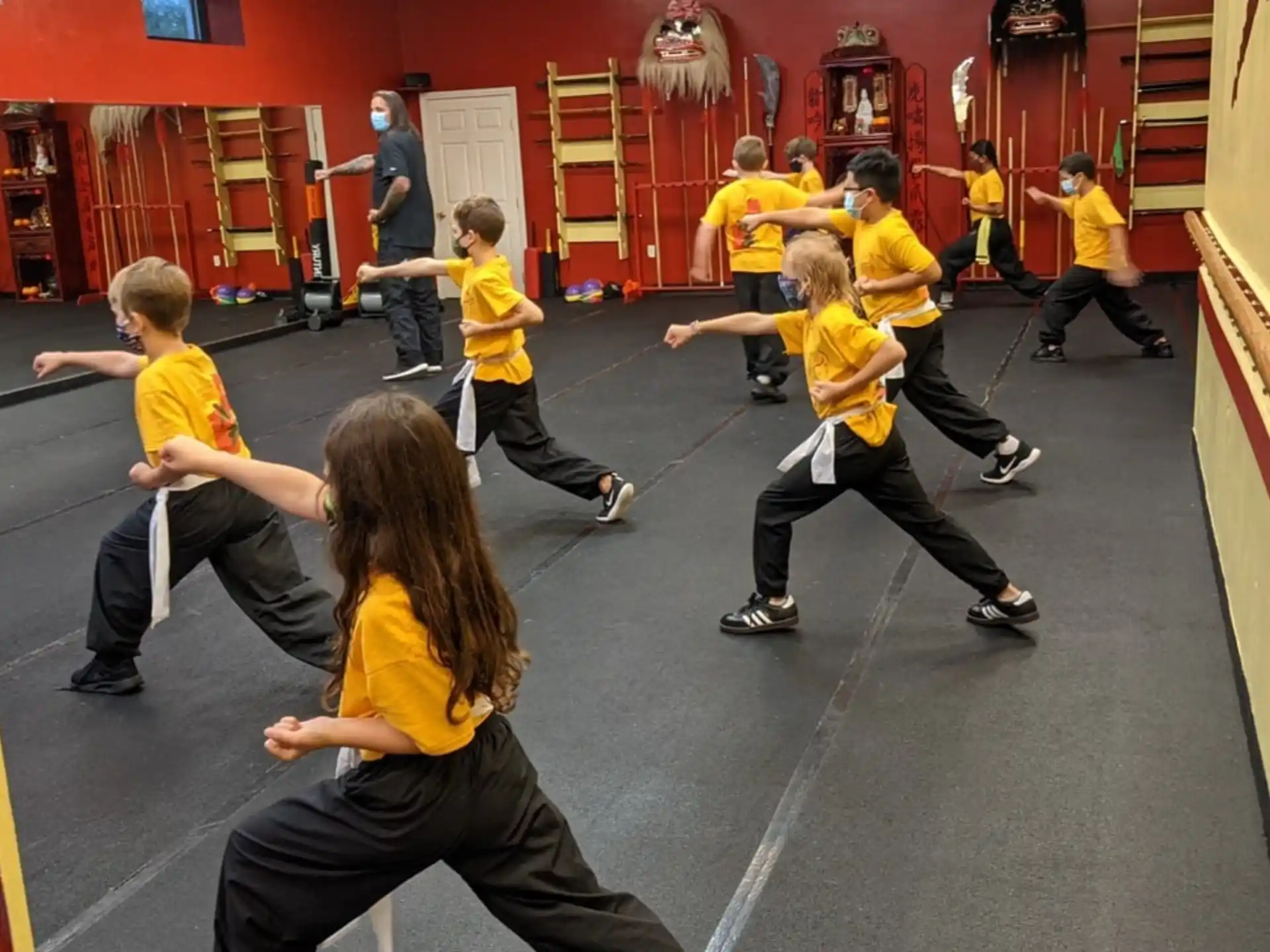a group of kids in a gym