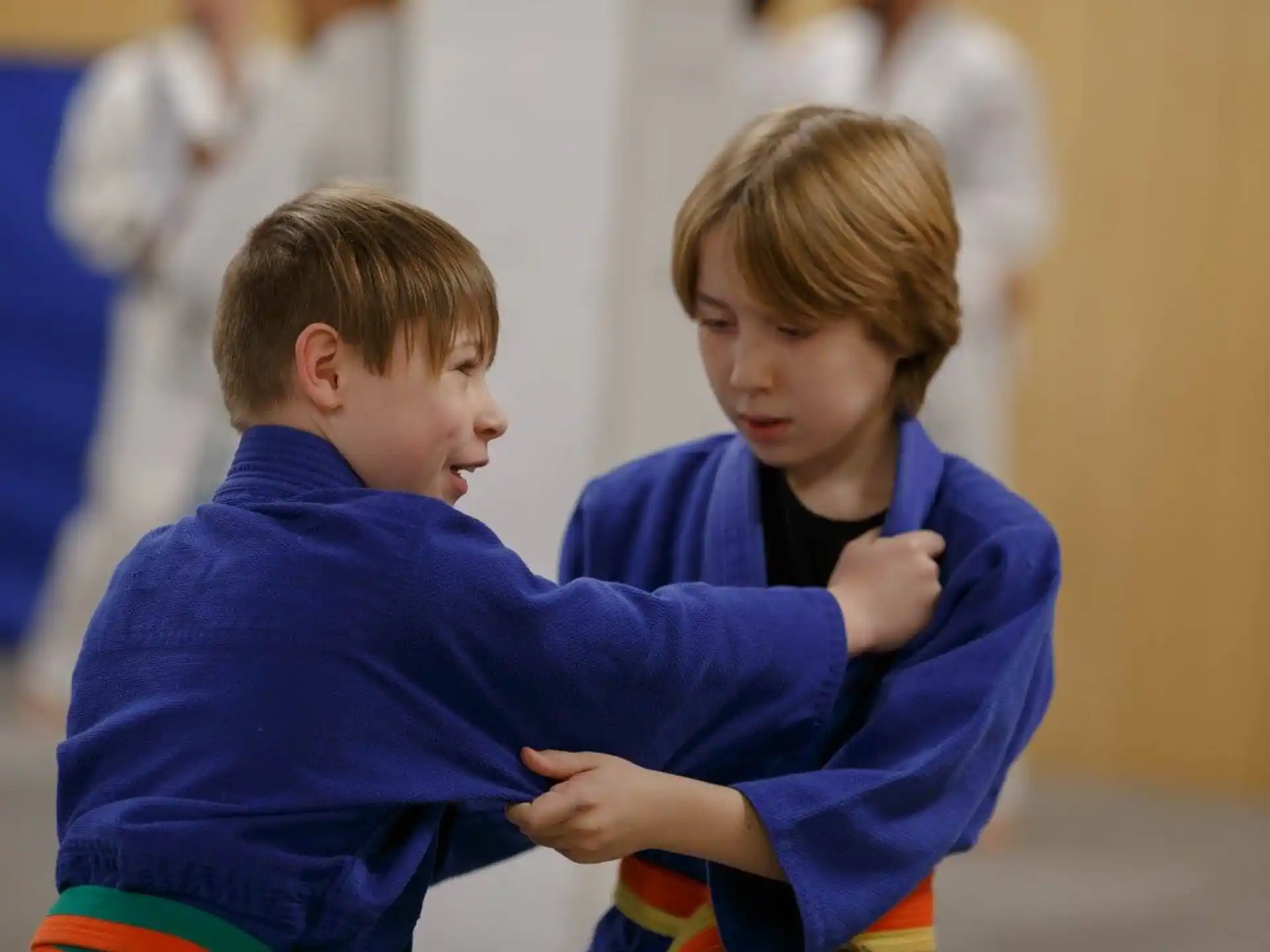a couple of boys hugging