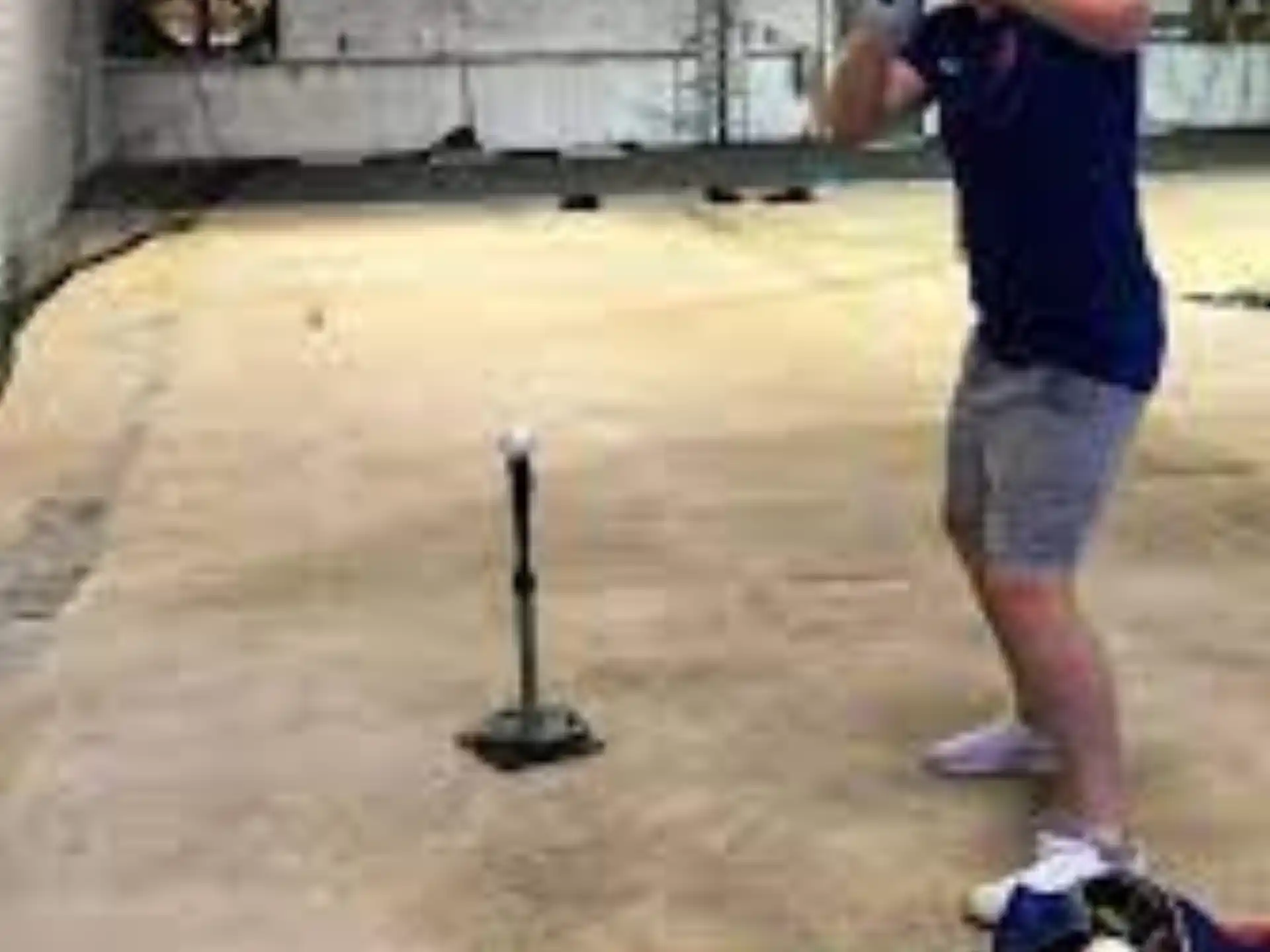 a man holding a baseball bat