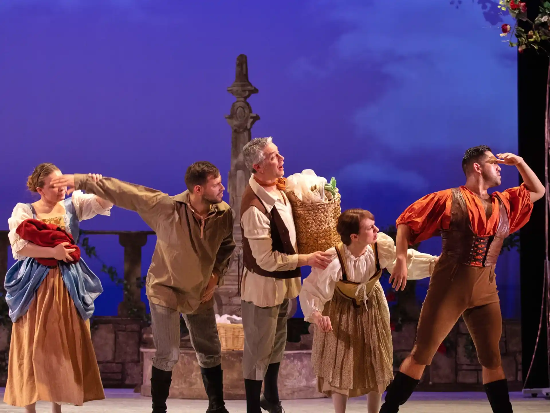 a group of people dancing on a stage