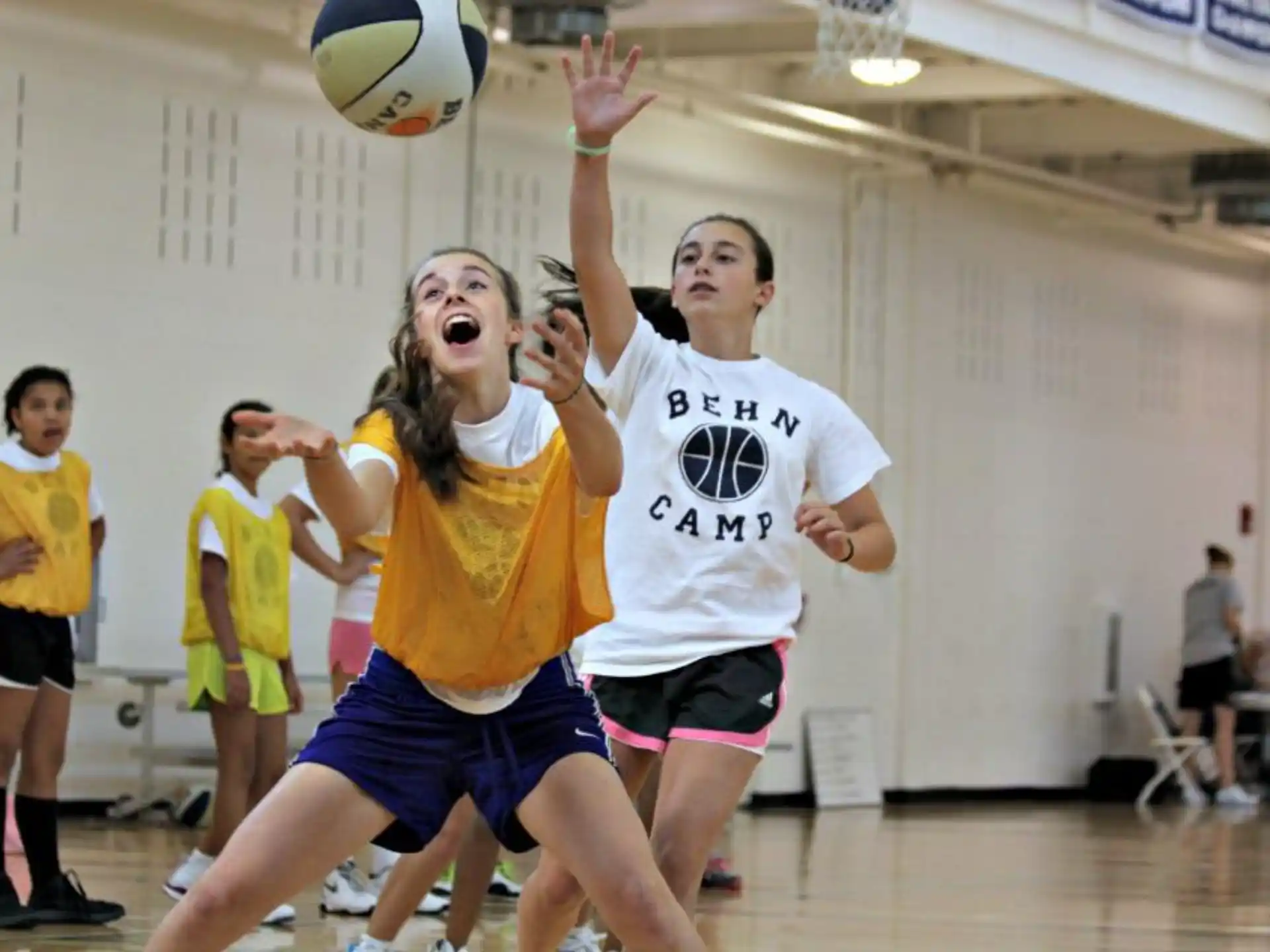 a group of people playing volleyball