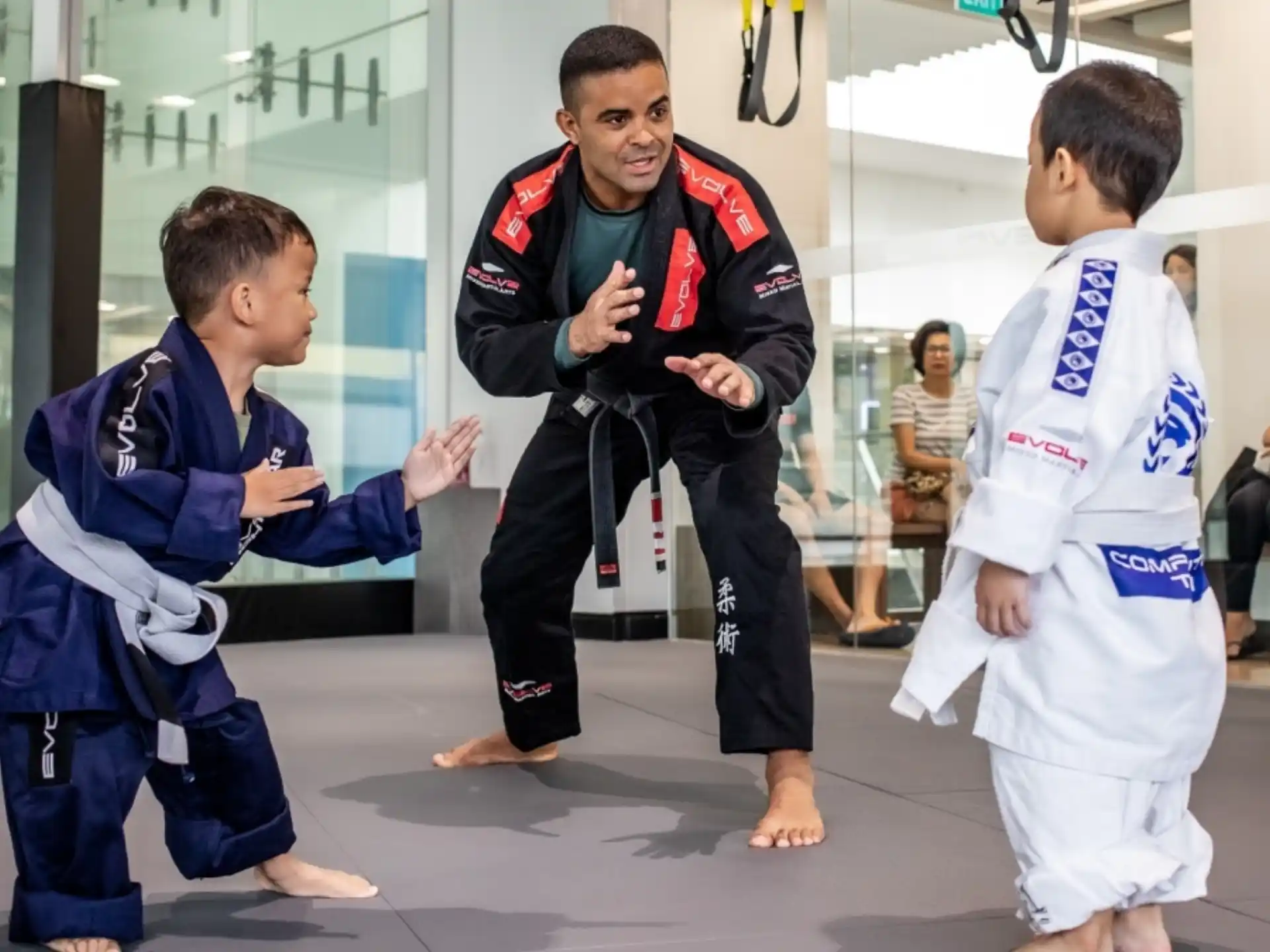 a group of people in karate uniforms
