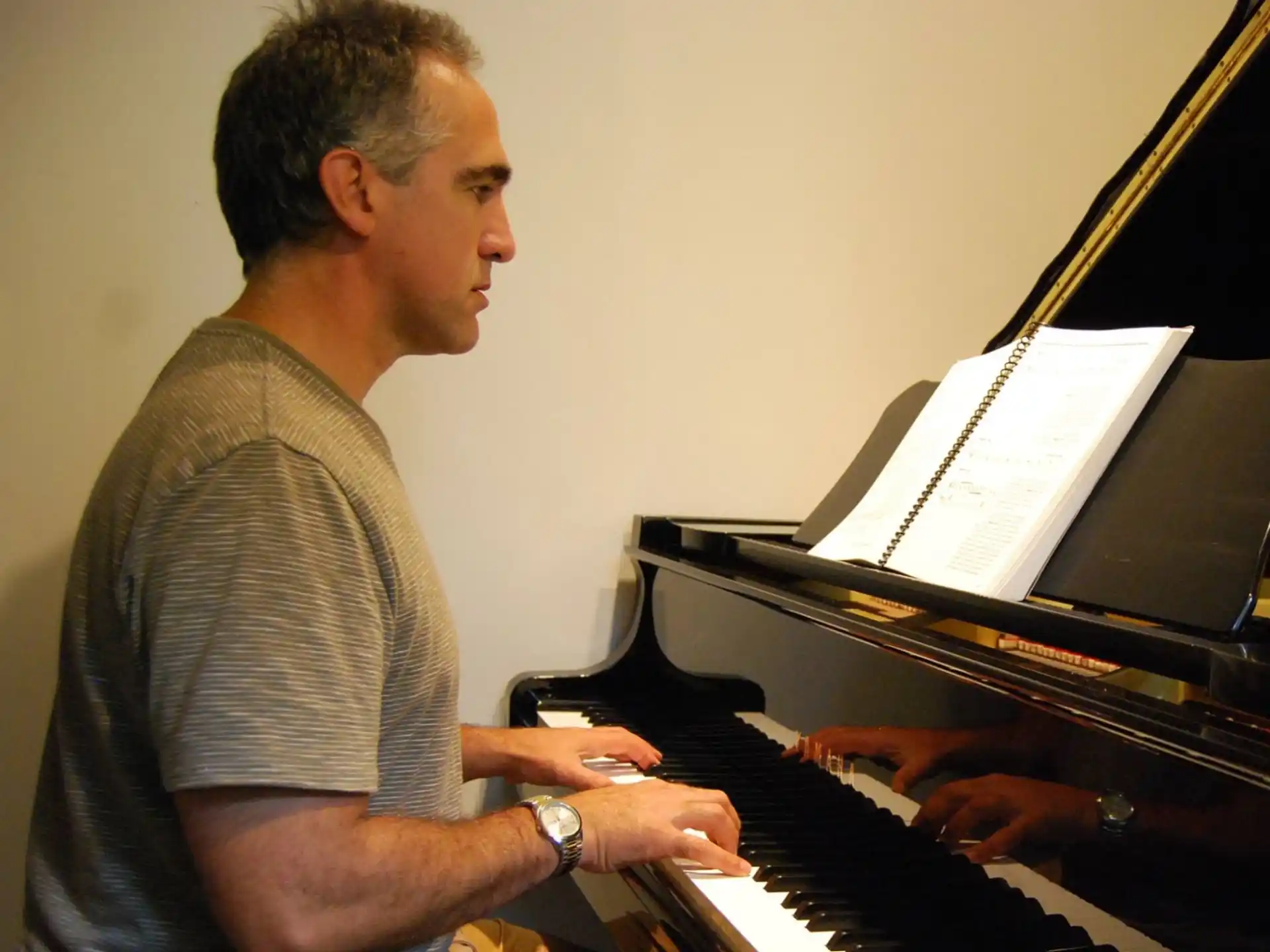 a man playing a piano