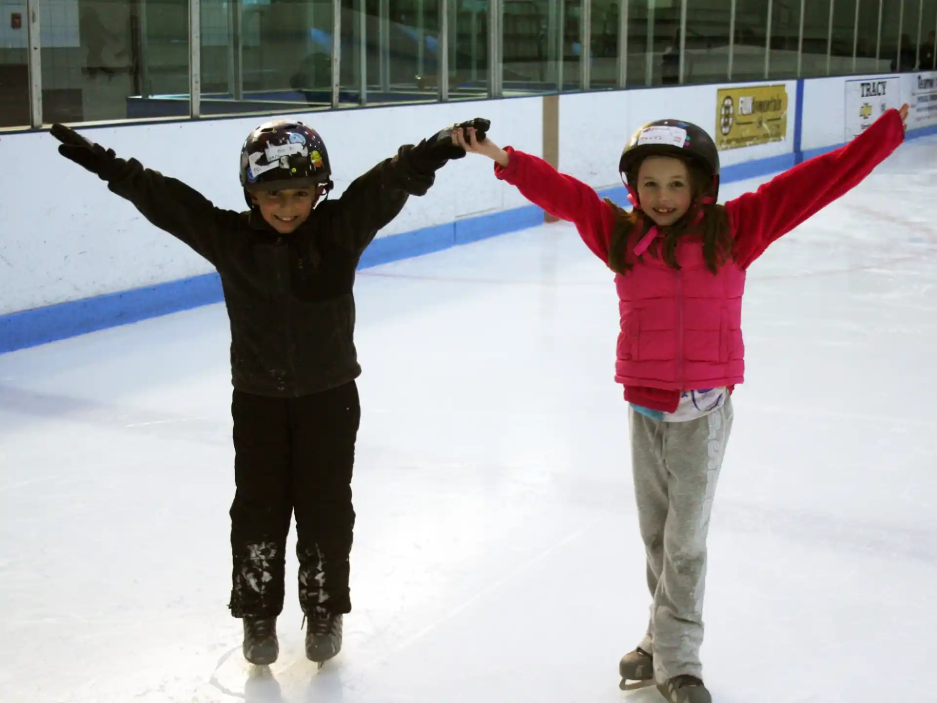 a couple of people on ice