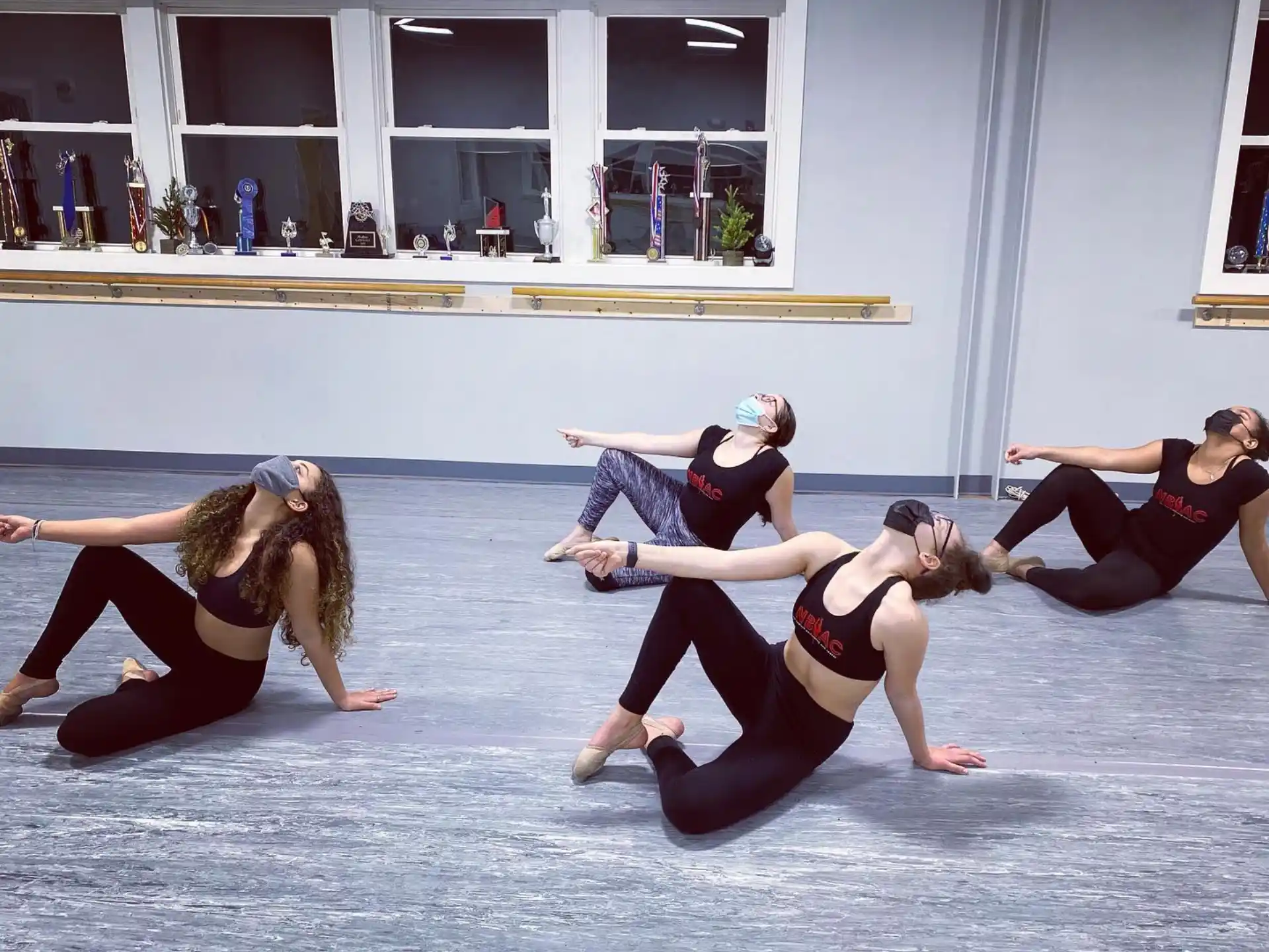 a group of women dancing on ice