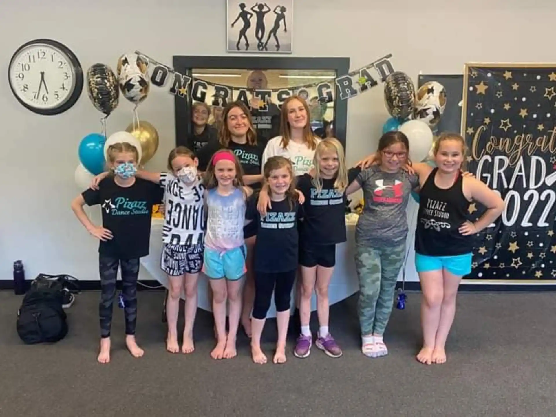a group of children posing for a photo