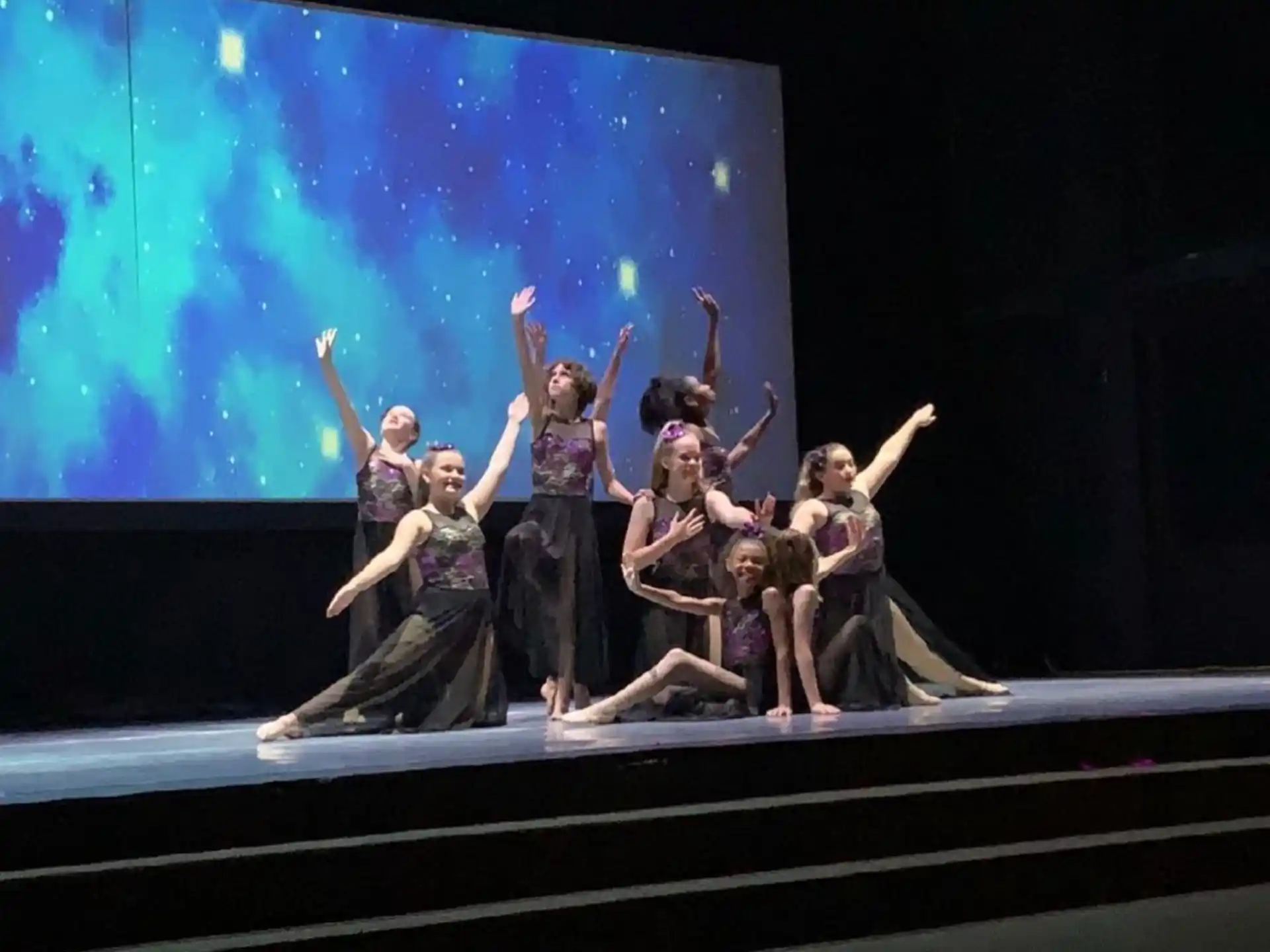 a group of people on a stage