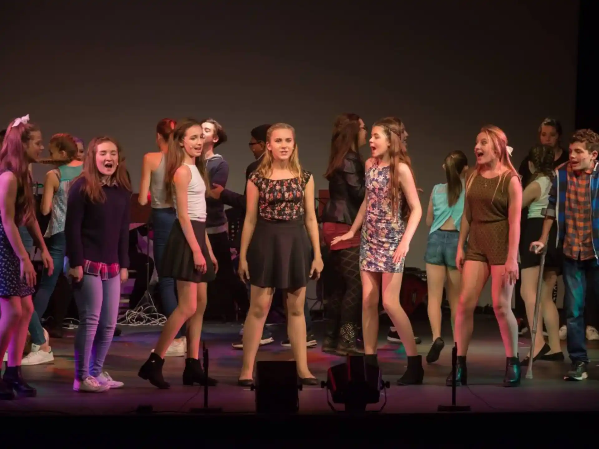 a group of people on a stage