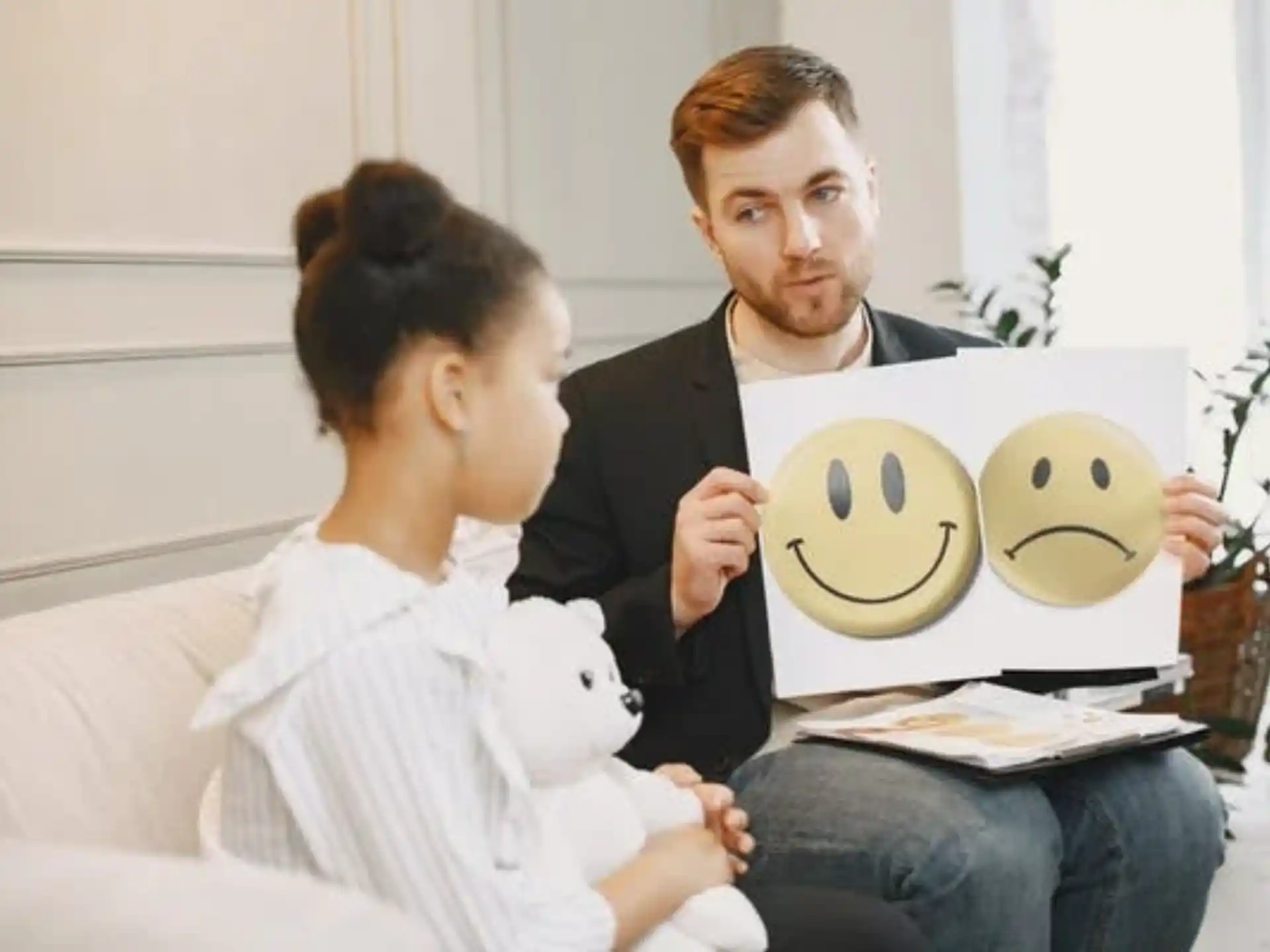 a man and a woman looking at a tablet
