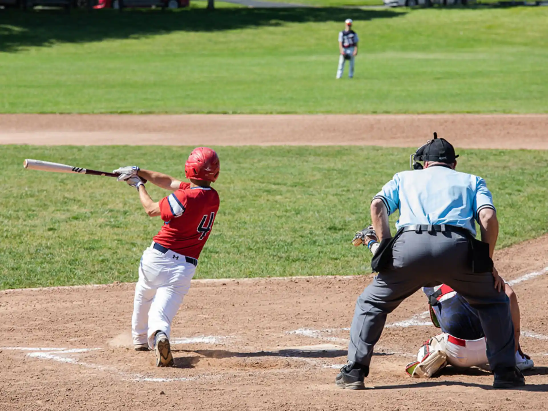 a baseball player swinging a bat