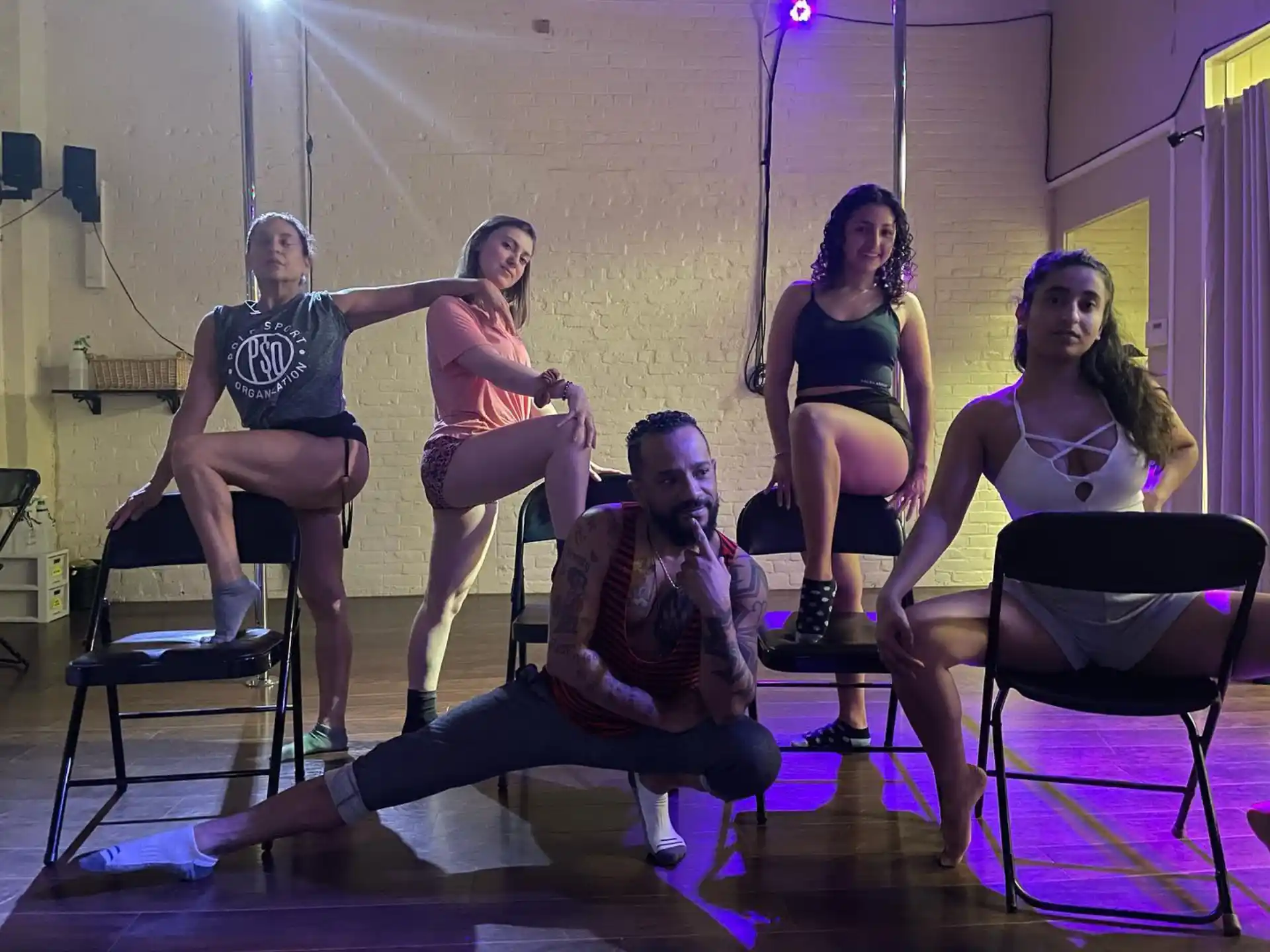 a group of people sitting on chairs