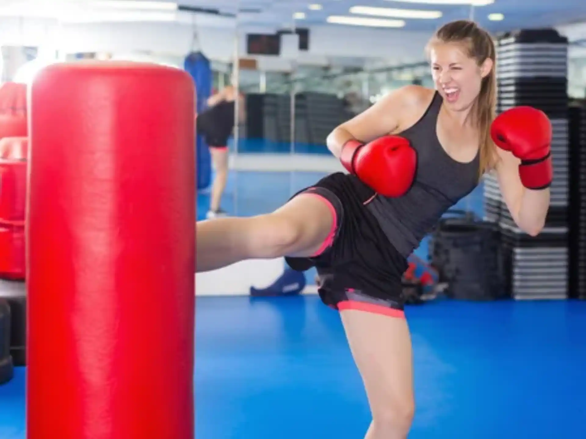 a woman in a boxing ring