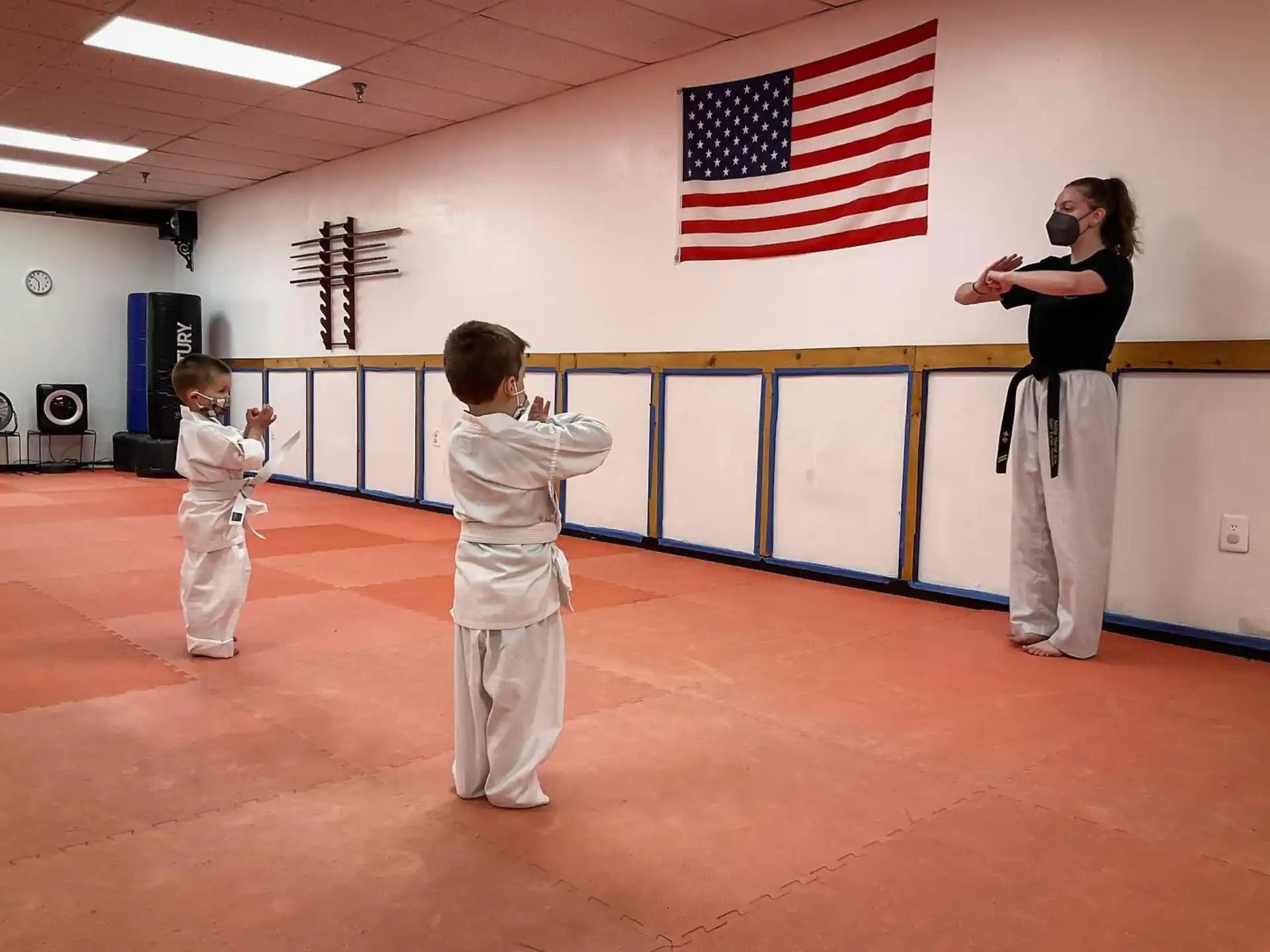 a person and a couple of kids playing a game