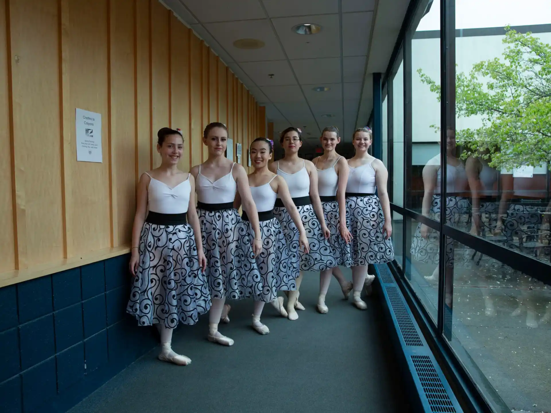 a group of women posing for a photo
