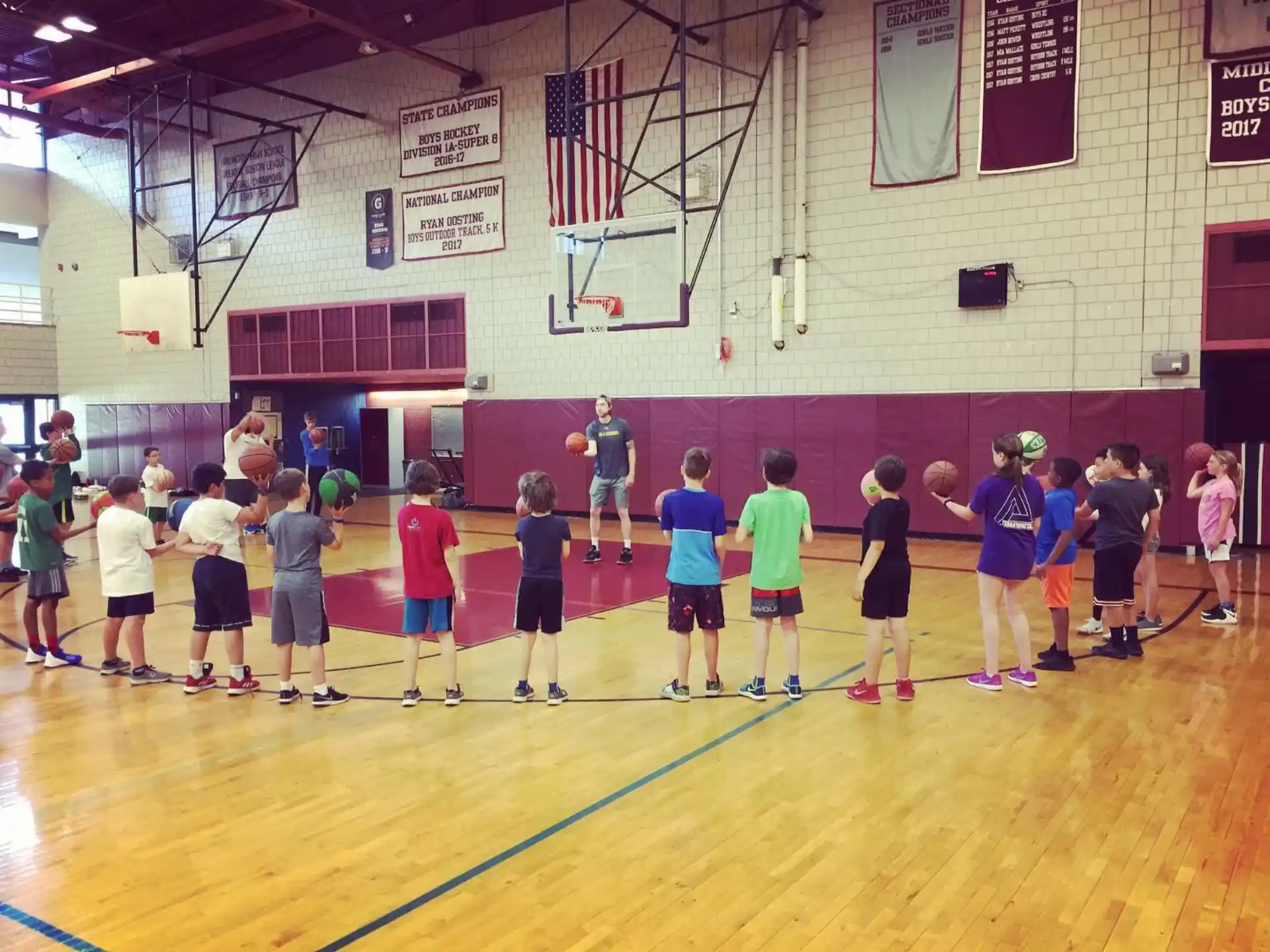 a group of people in a gym