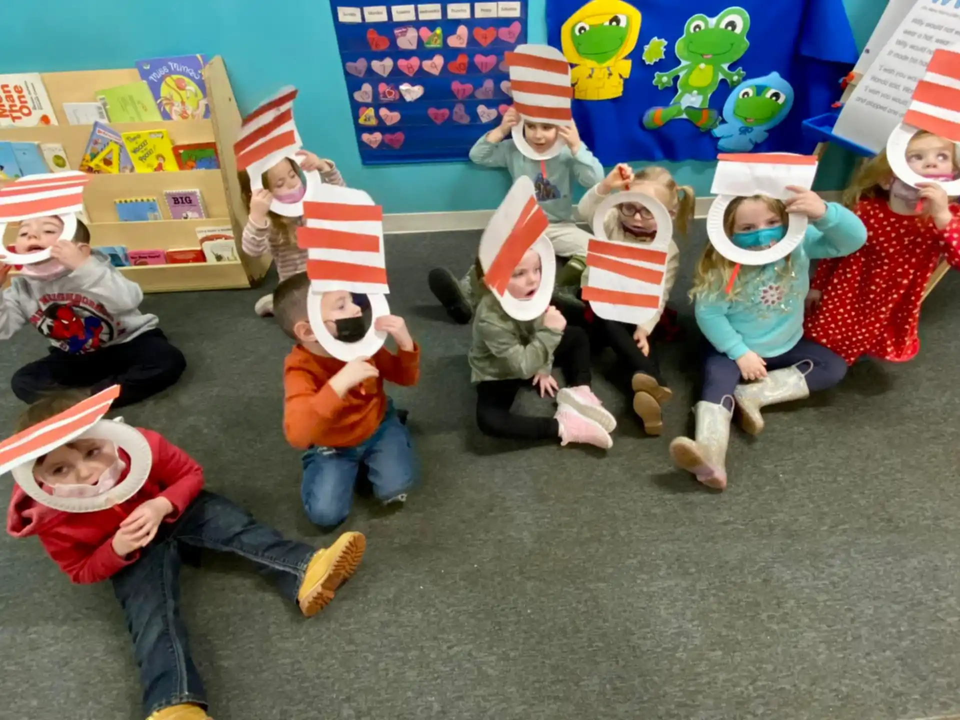 a group of children wearing hats